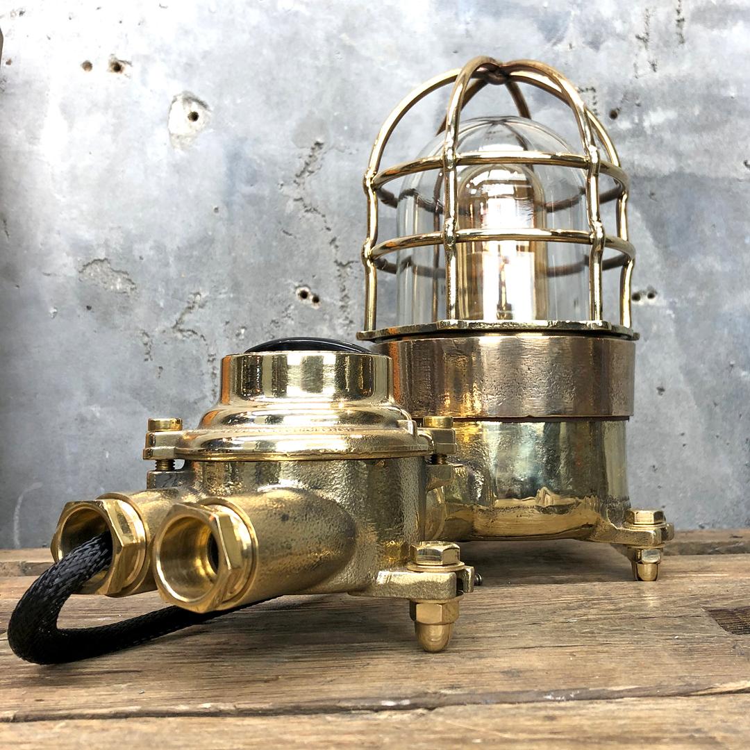 A vintage Industrial cast bronze and brass explosion proof table lamp with an isolator switch manufactured circa 1975 by Wiska and Centurion who are manufacturers of Ex. (explosion proof) rated fixtures. The lamp comes fitted with a cast brass Wiska