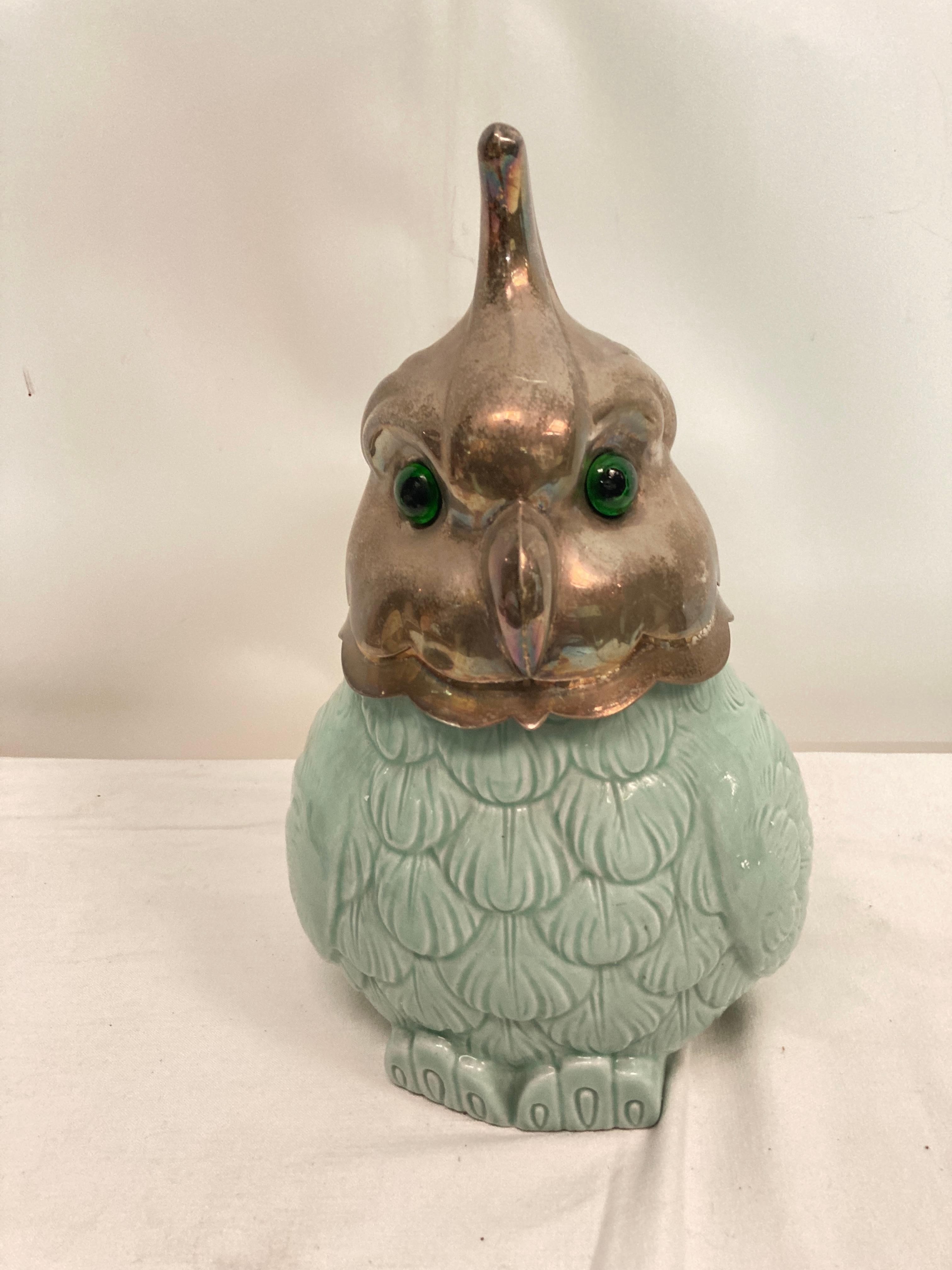 Very nice pot forming a charming parrot 
Celadon porcelain, silver plated and glass eyes
1970's