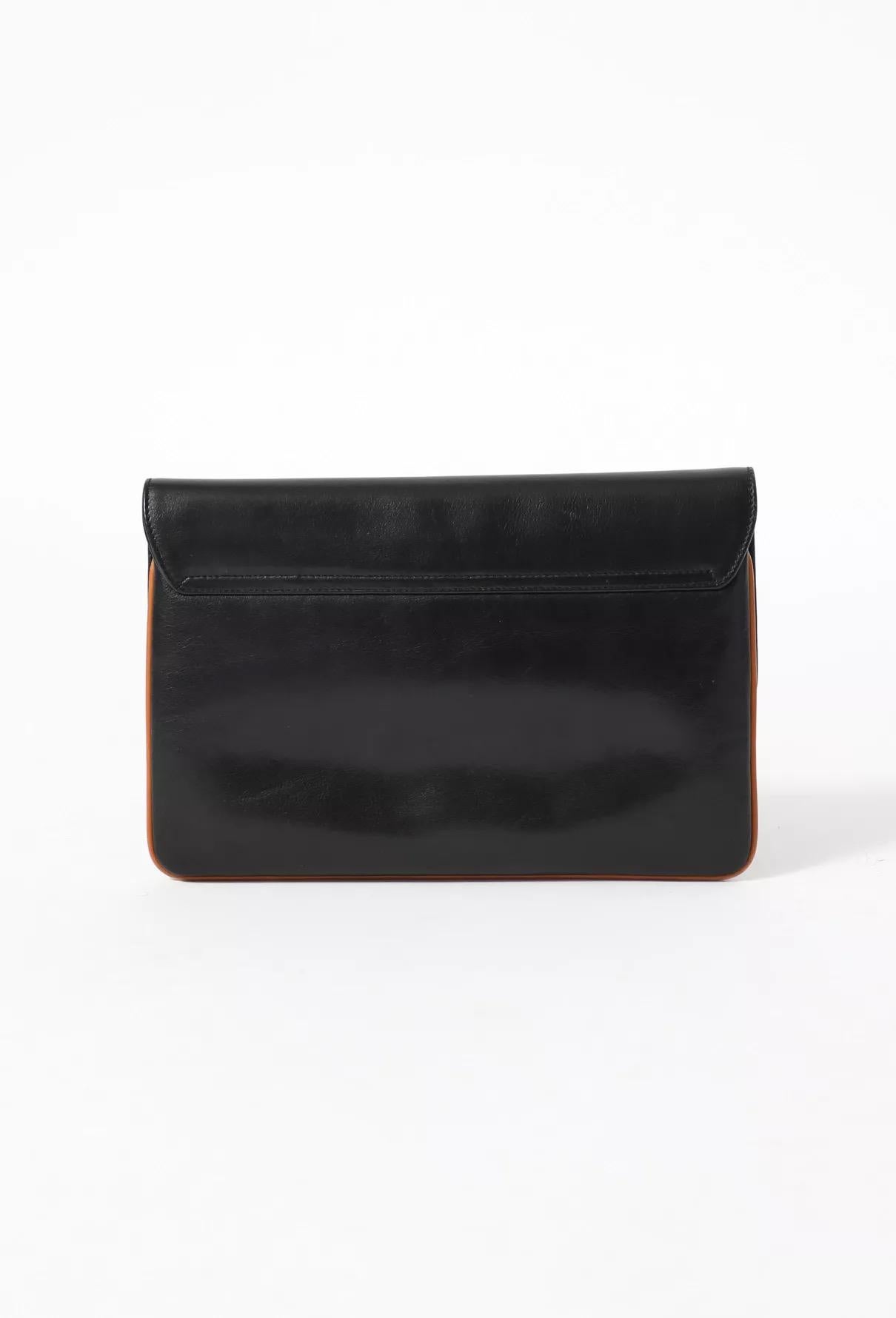 1970s Celine Black Leather Caleche Clutch 1