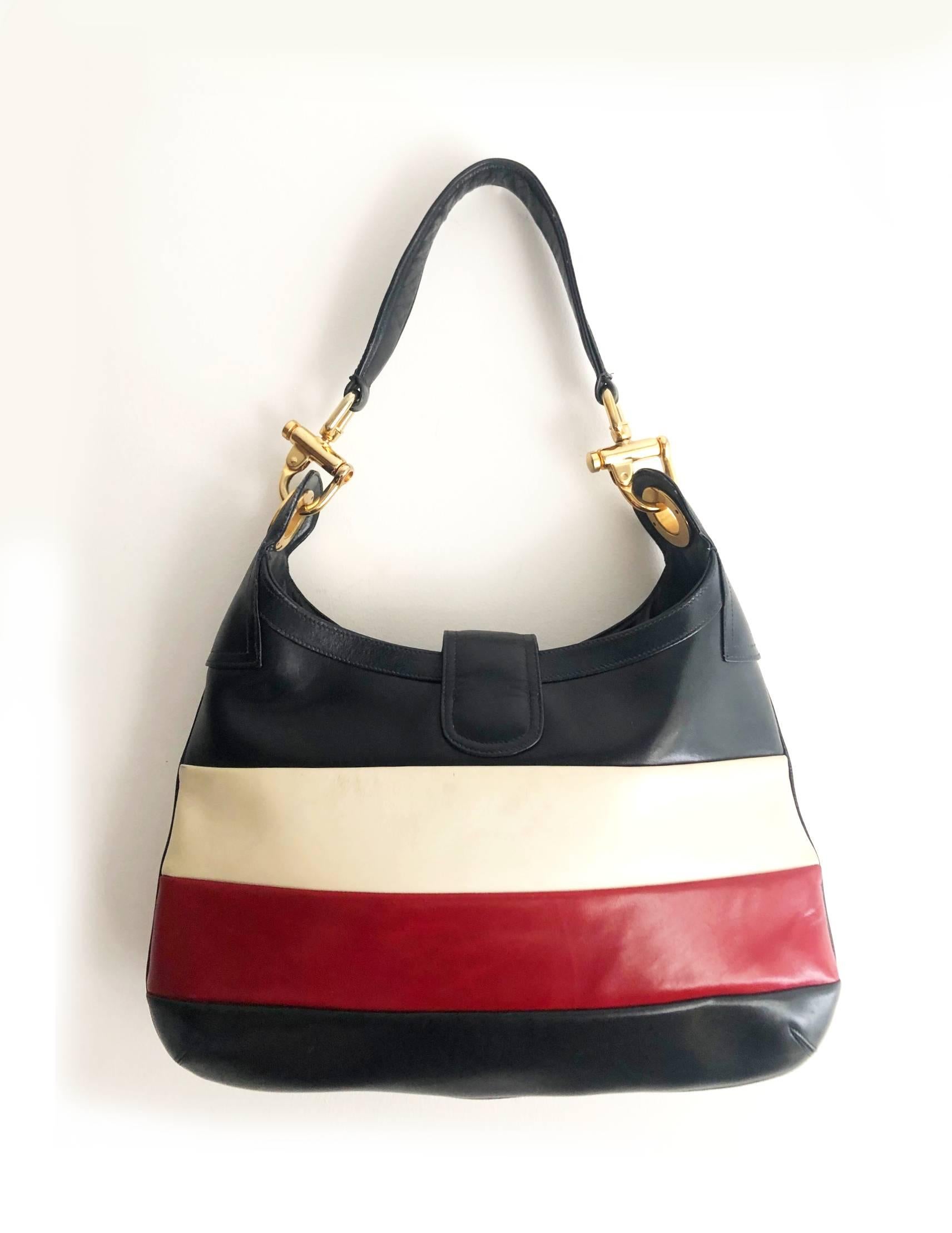 FREE and WORLDWIDE DELIVERY 

Rare Celine Paris tote bag in thick leather, navy blue, red and white stripe, gold tone metal ware, lining in navy blue leather, inside zipped pocket, Made in Italy 

Condition: 1970s, excellent vintage, slight sign of