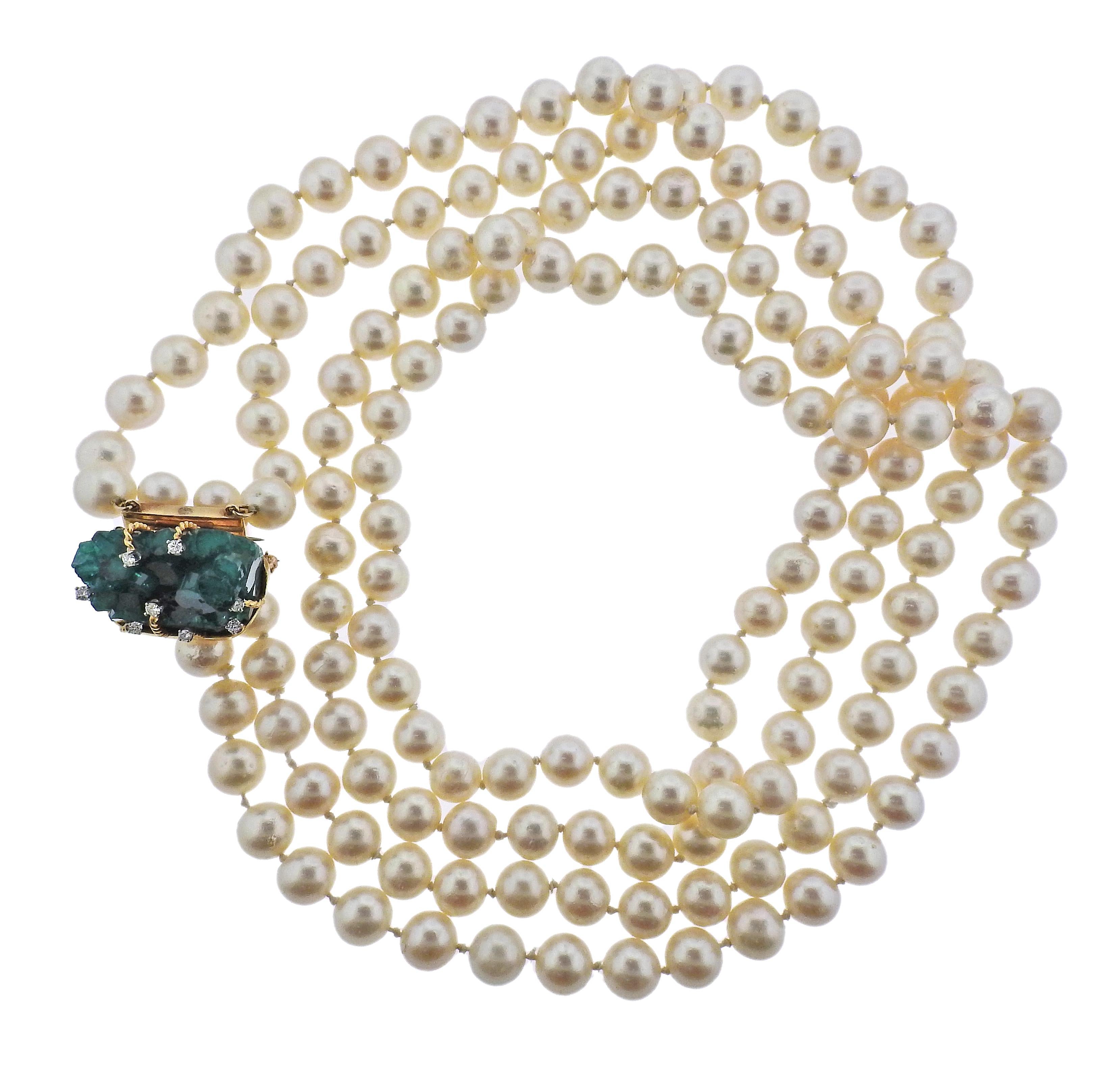 1970s Cellino 18k gold necklace, set with Chatham emeralds, pearls measuring 7.5-8.5mm pearls and approx. 0.24ctw in diamonds. Necklace is 31