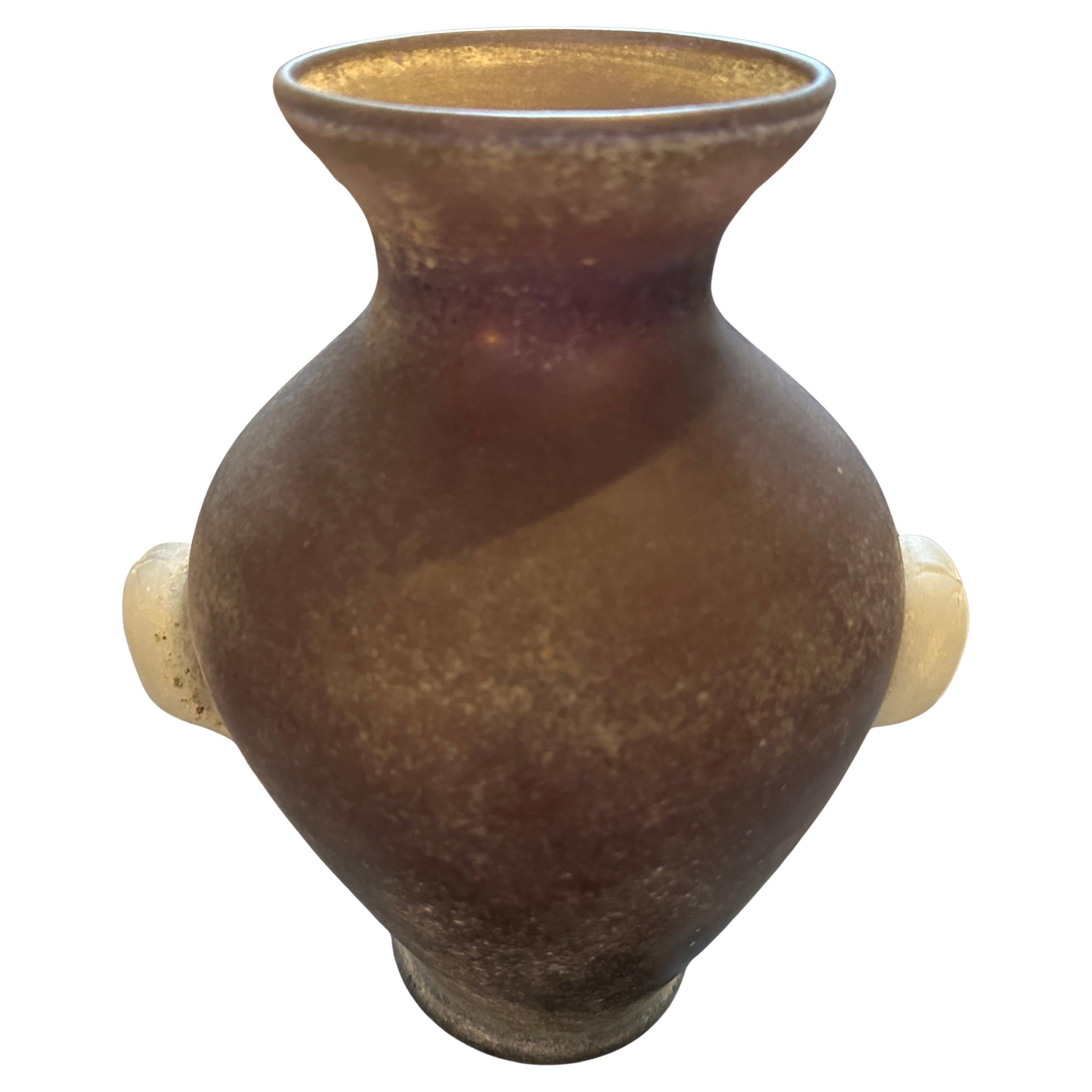  Vintage 1970s Modern Purple and White Scavo Murano Glass Amphora Vase
This impressive vintage vase, hailing from the 1970s, is a remarkable example of the 