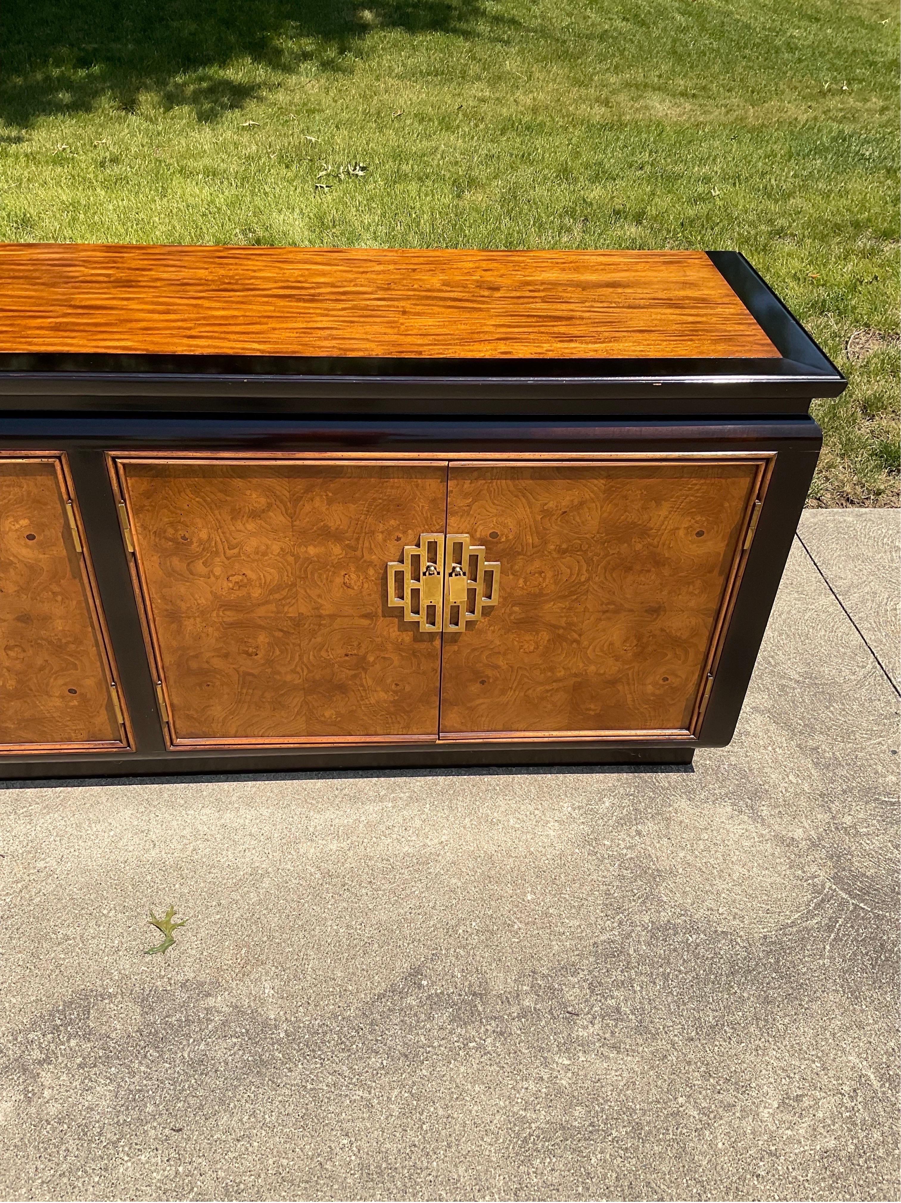 Beautiful piece from Century Furniture’s Raymond Sobota Designed Chin Hua Collection. One of the most recognizable pieces of vintage Chinoiserie Furniture. Spectacular Burled veneers surrounded by a lacquered, ebonized case. Incredible detail and