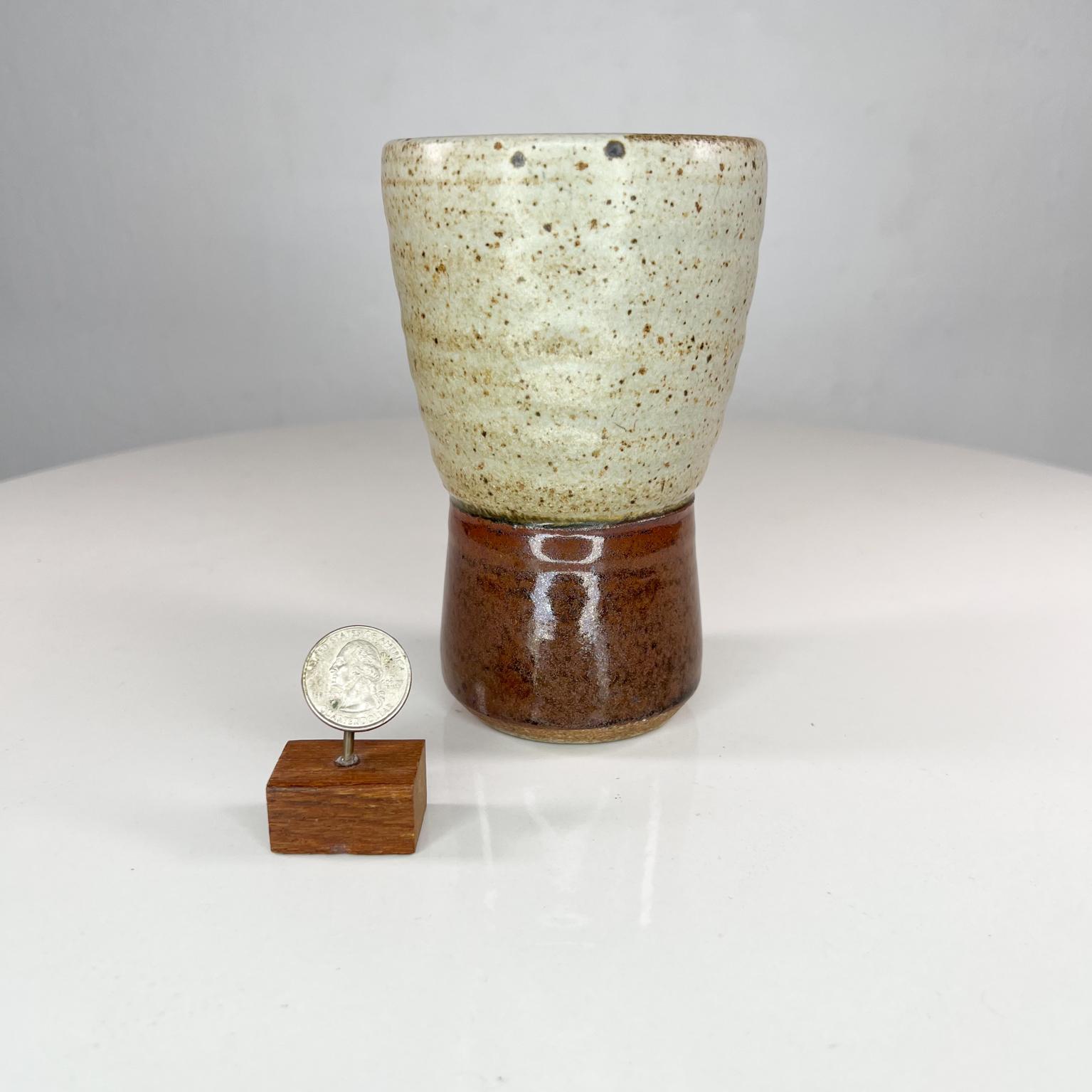 1970s Ceramic Art Pottery Tapered Tumbler Speckled Glass
3.75 diameter x 5.88 tall
Original good shape vintage clean presentation
Appears signed as MN
Refer to images shown please.

