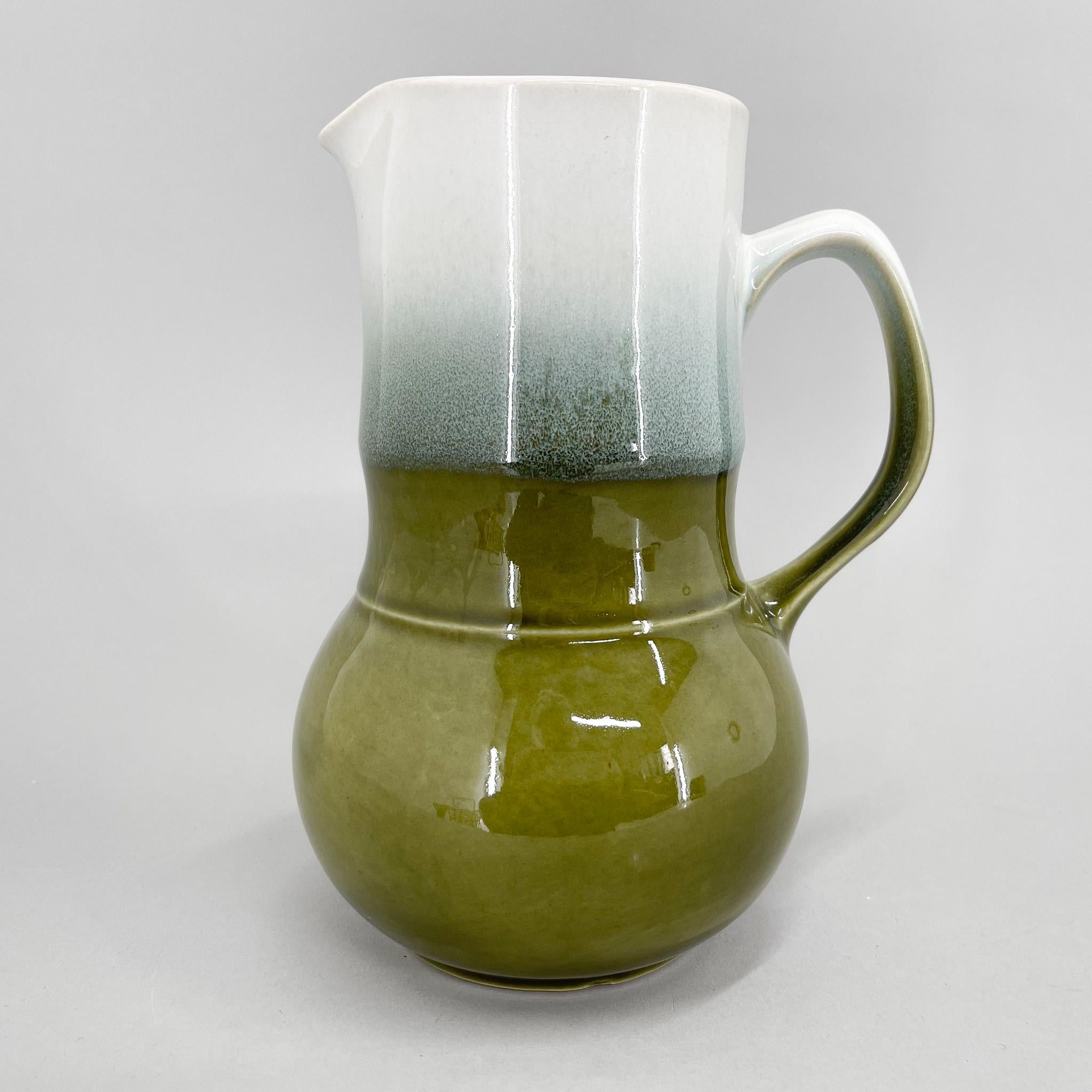 Glazed ceramic vintage jug in green and white color, produced by Ditmar Urbach in former Czechoslovakia in the 1970s.