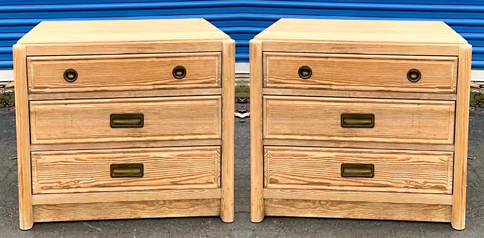 This is a pair of cerused pine Campaign style side tables or nightstands by Henry Link. They are in very good condition.

My shipping is for the Continental US only.