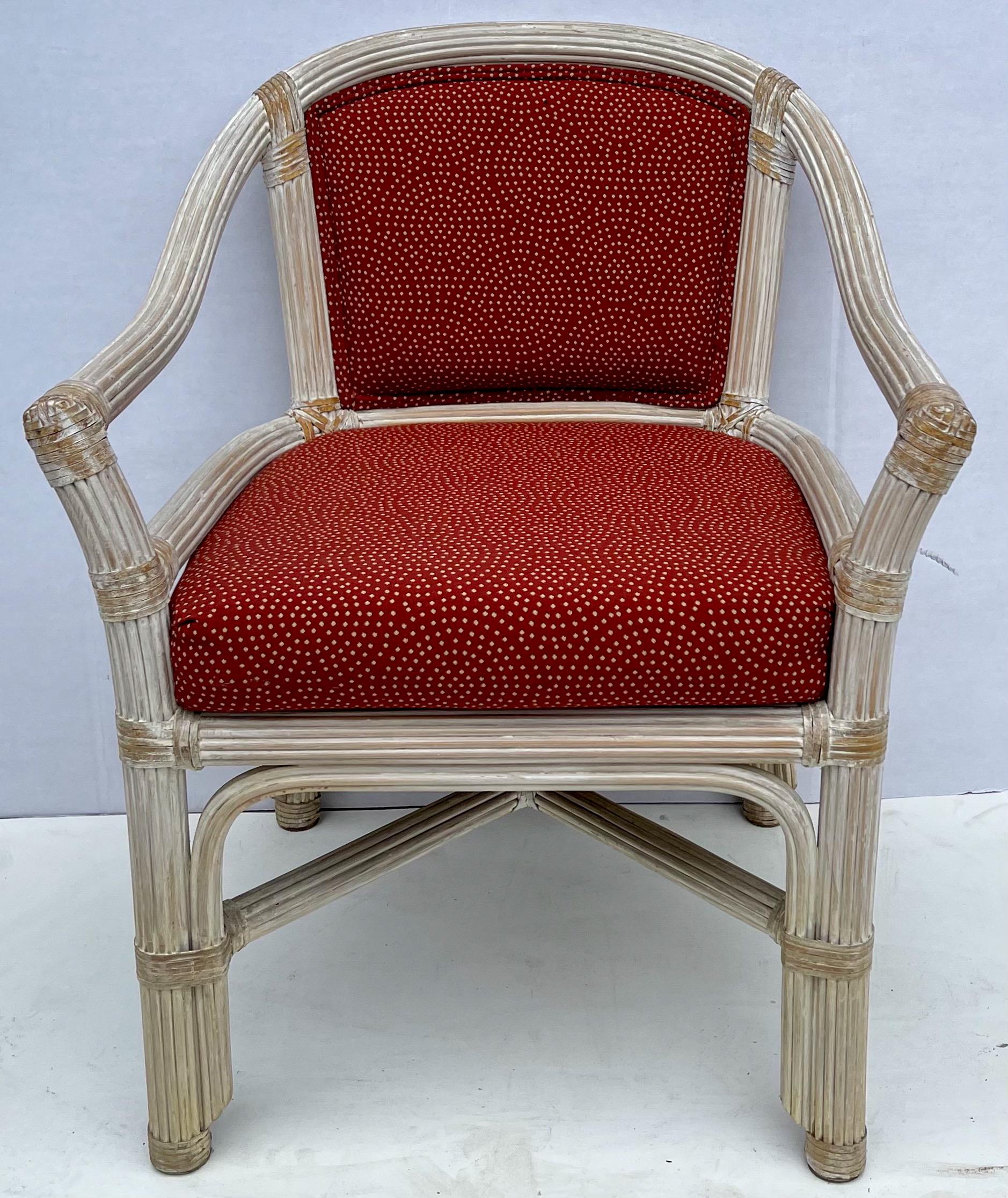 This is a nice set of cerused reeded pencil bamboo chairs by Henry Link. The upholstery is vintage but in very good condition. The chairs are marked.