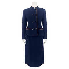 1970's Chanel Creations Paris Navy Bouclé Suit Trimmed in Burgundy