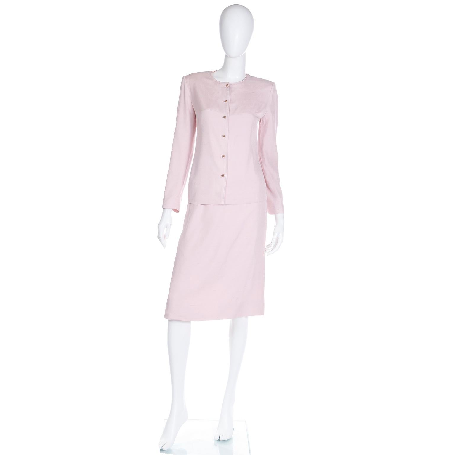 Who doesn't love pink vintage Chanel? This is a vintage 1979 or 1980 Chanel 2 piece skirt suit in a gorgeous raw silk. Chanel Creations was the first Chanel ready to wear line that was introduced by the French fashion designer Philippe Guibourge in