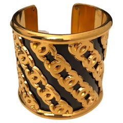1980s Vintage CHANEL Gold Toned and Black Multi CC Statement Cuff Bracelet
