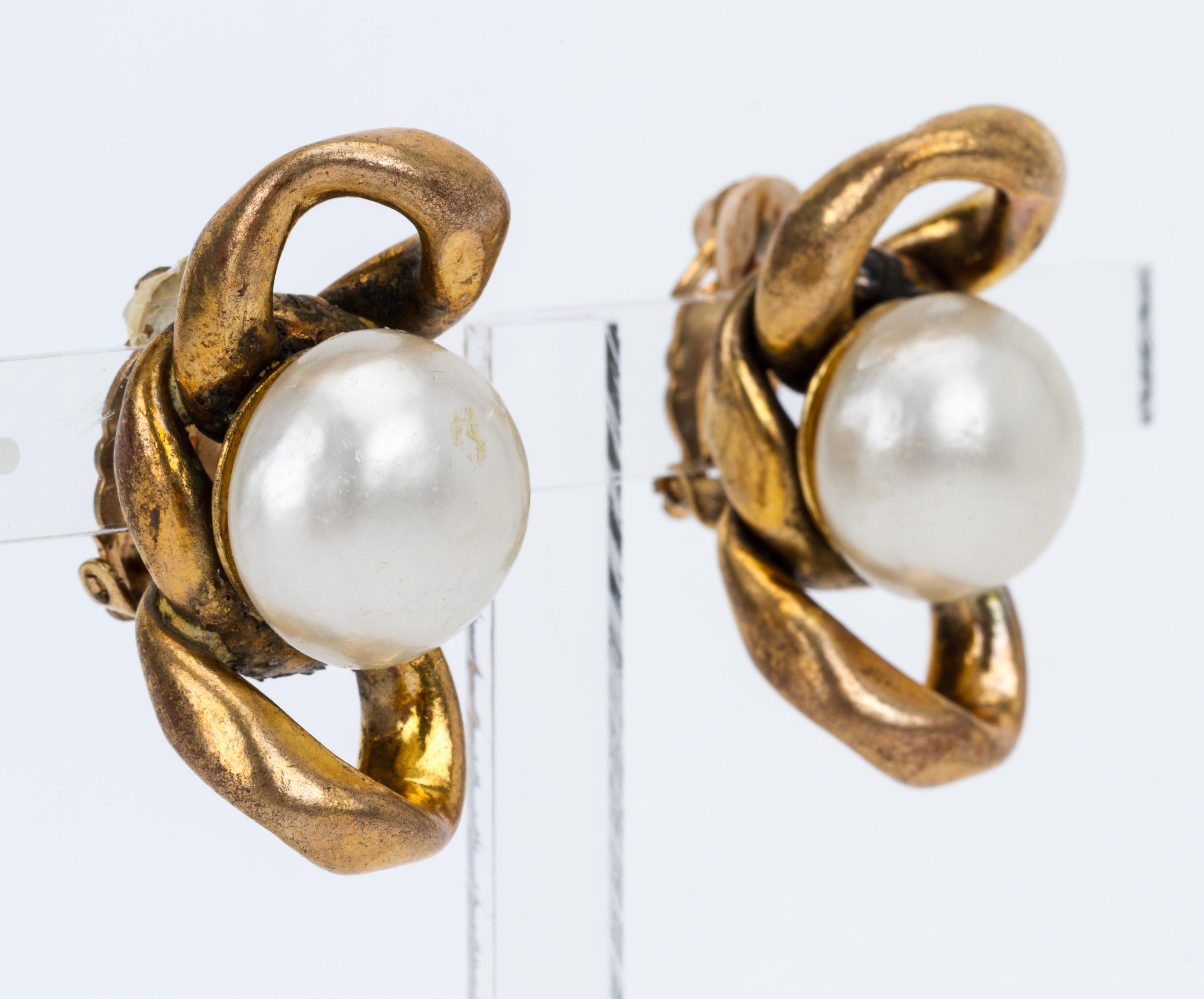 Chanel gold chain earrings with pearl center. Patina due to age. Come with original box.