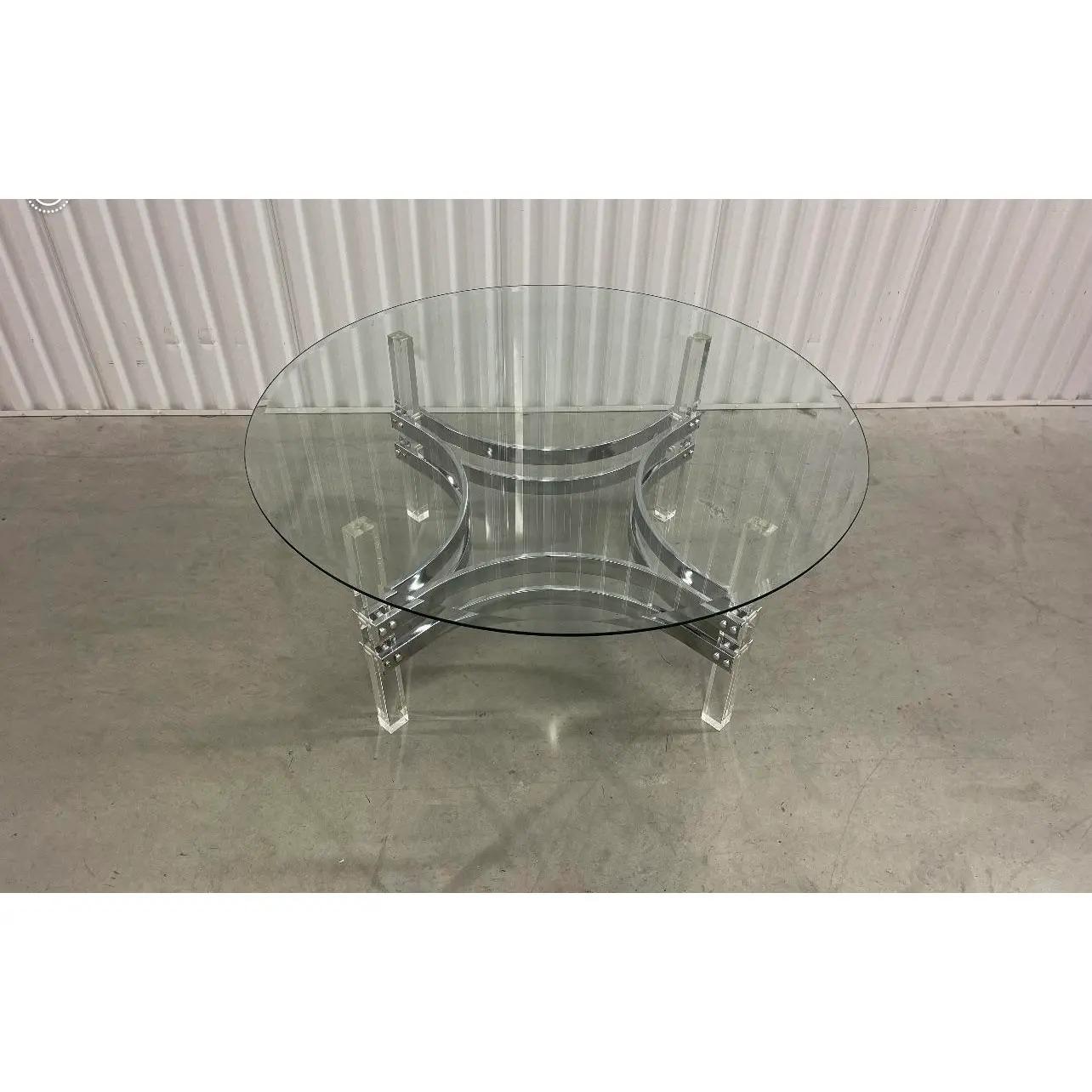 This beautiful 1970s Charles Hollis Jones style chrome and lucite coffee table is the perfect centerpiece for your home or office.