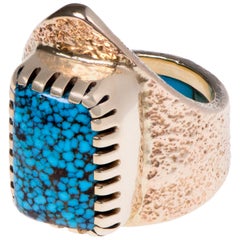 1970s Charles Loloma Nevada Blue Turquoise and Tufa Cast Gold Ring
