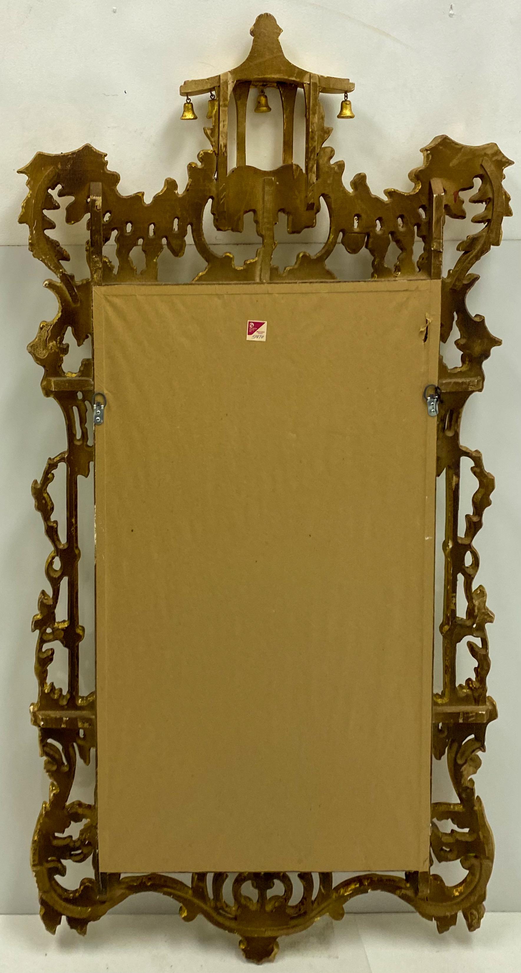 This is a Chinese Chippendale style carved giltwood Italian mirror by Decorative Crafts. It is in very good condition, and it does have the label.