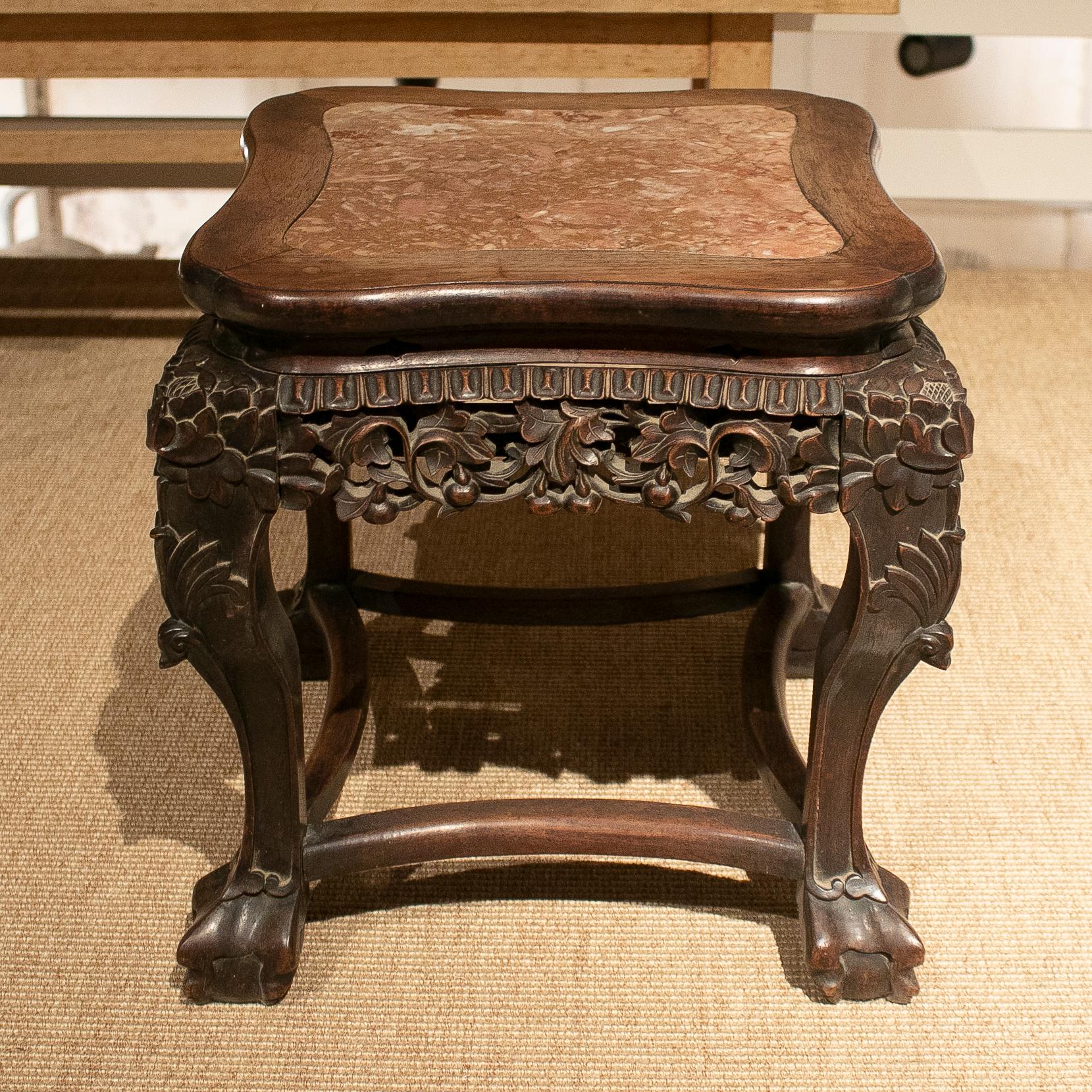 1970s Chinese hand carve ornate mahogany table with marble top.