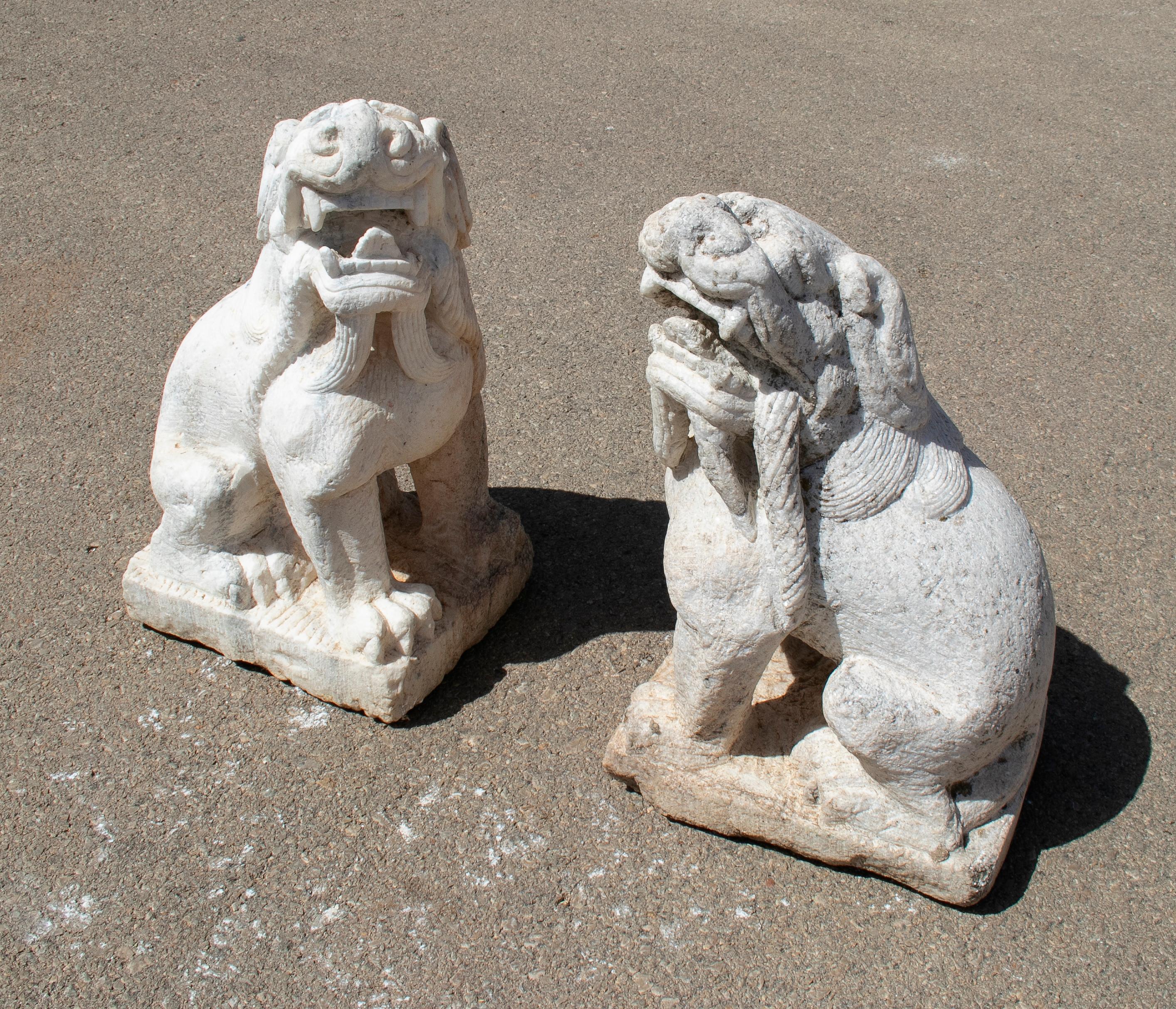 Asian 1970s Chinese Pair of Hand Carved White Marble Lions For Sale