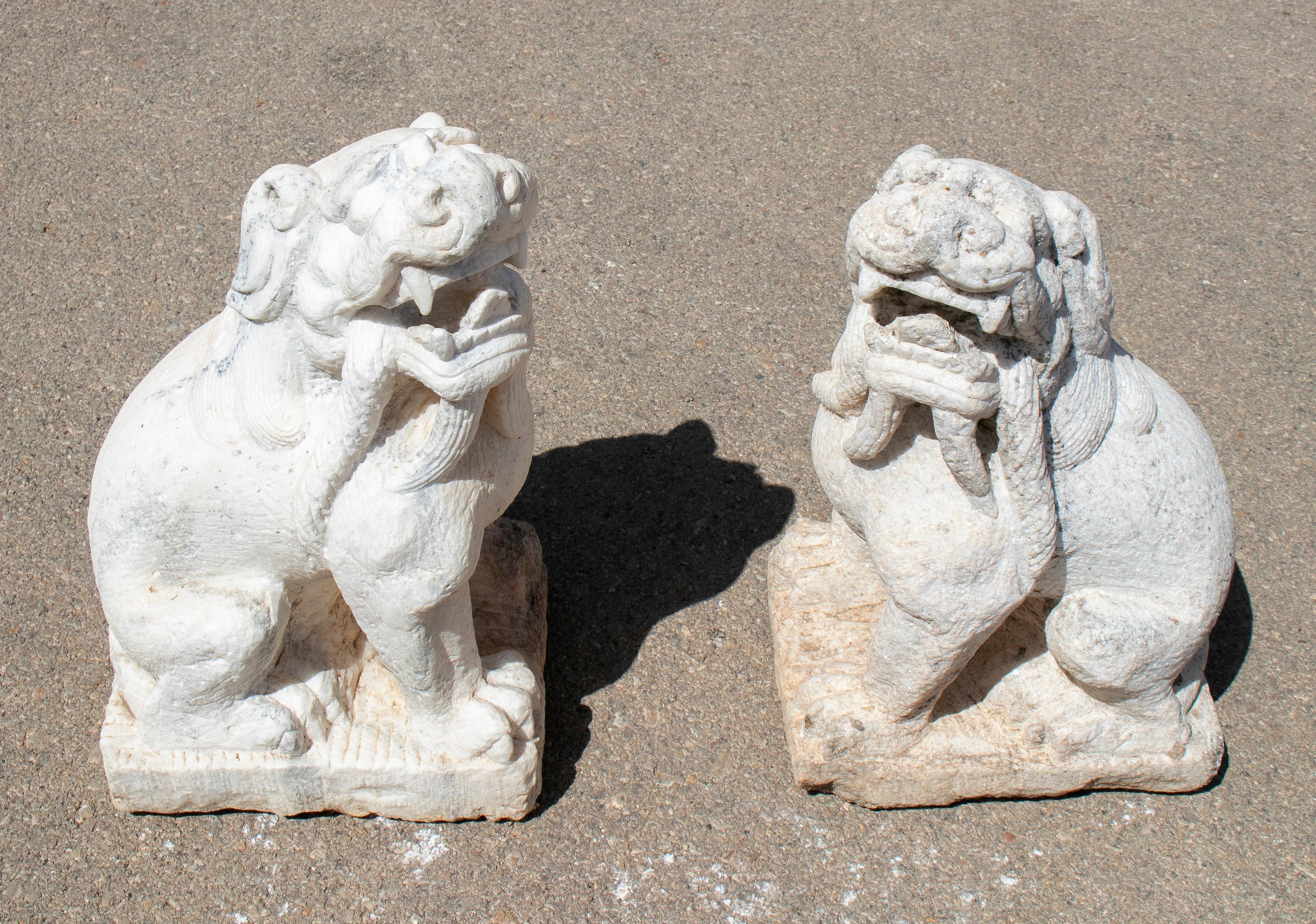 Hand-Carved 1970s Chinese Pair of Hand Carved White Marble Lions For Sale