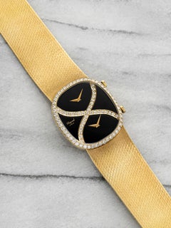 1970s Chopard Dual Time 18K Yellow Gold Onyx Diamond Dial Manual 30mm
