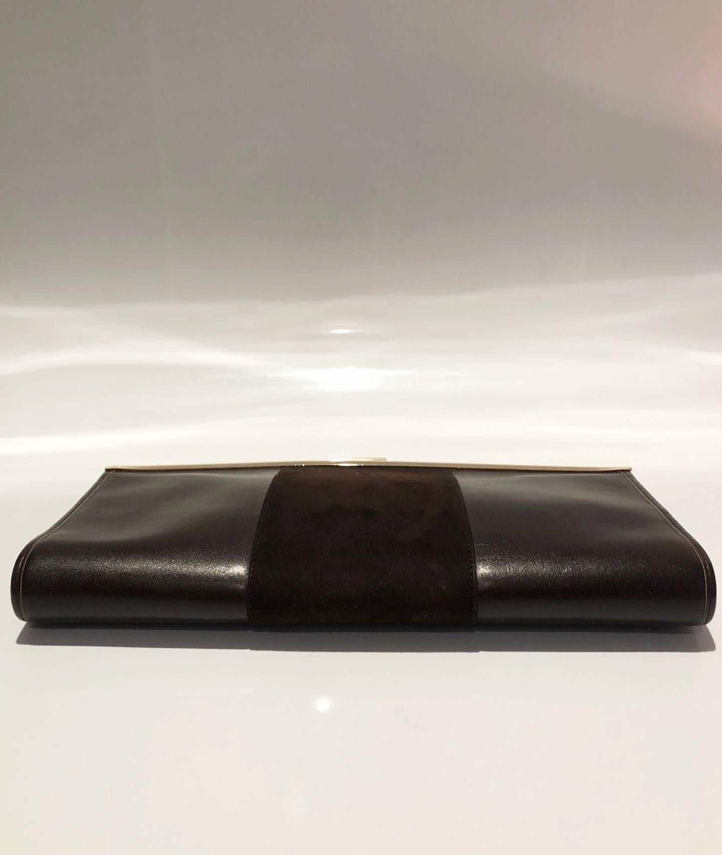 FREE UK and WORLDWIDE DELIVERY 
Christian Dior dark brown envelope clutch bag, gold tone metal ware, suede detailing, Dior logo printed on front top clutch closure, Made in France
Condition: 1970s, excellent, gold ware in immaculate condition