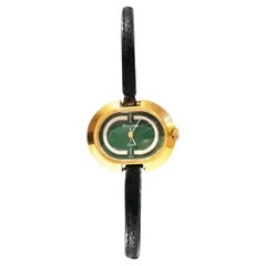 1970s Christian Dior by Bulova 14K Gold Green Oval Dial Watch