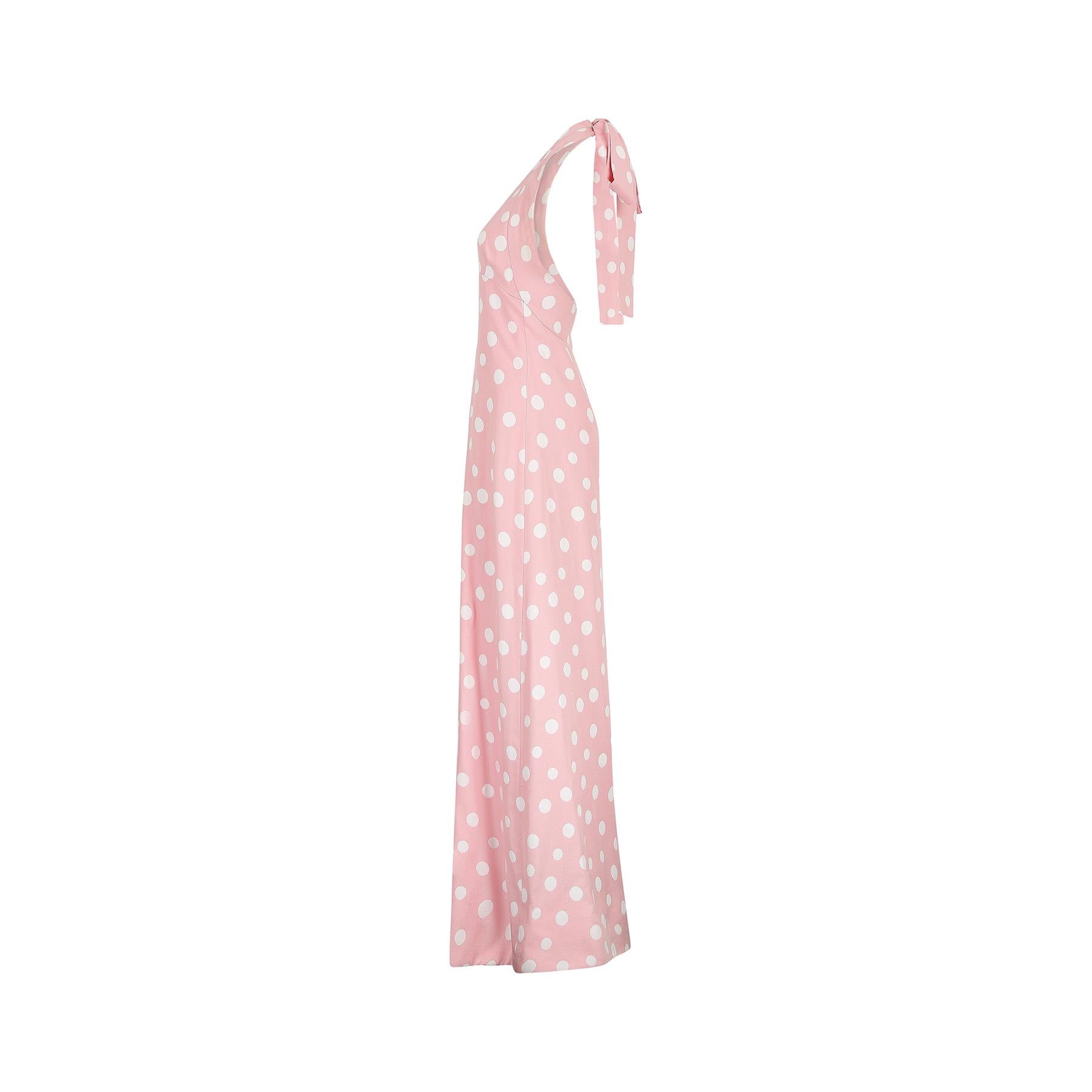 1970s Christian Dior pink and white polka dot maxi dress.  This is a rare example of a labelled Christian Dior Patron label which indicated that the dress was a bespoke order which could only be ordered by haute couture clients.  It's made in a