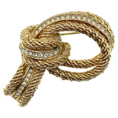 1970s Christian Dior Knotted Gold Rope and Crystal Brooch