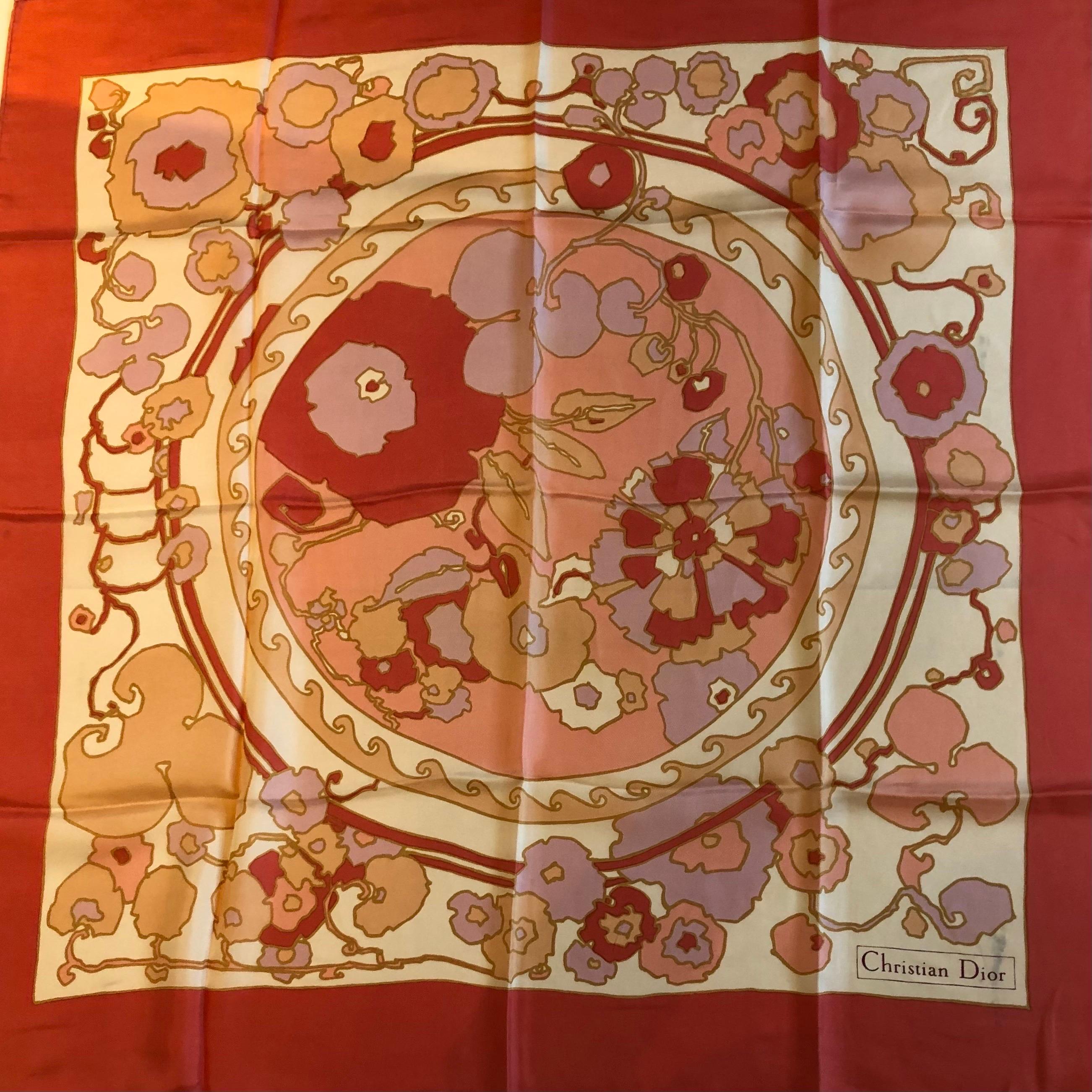1970s CHRISTIAN DIOR Print Scarf Dark Pink Multi Vintage
Christian Dior beautiful silk scarf in pastel tone, pink, lilac, brown, with off-white background, flower motifs print, 100% silk.  The CD box is not for sale with the scarf.

Condition: