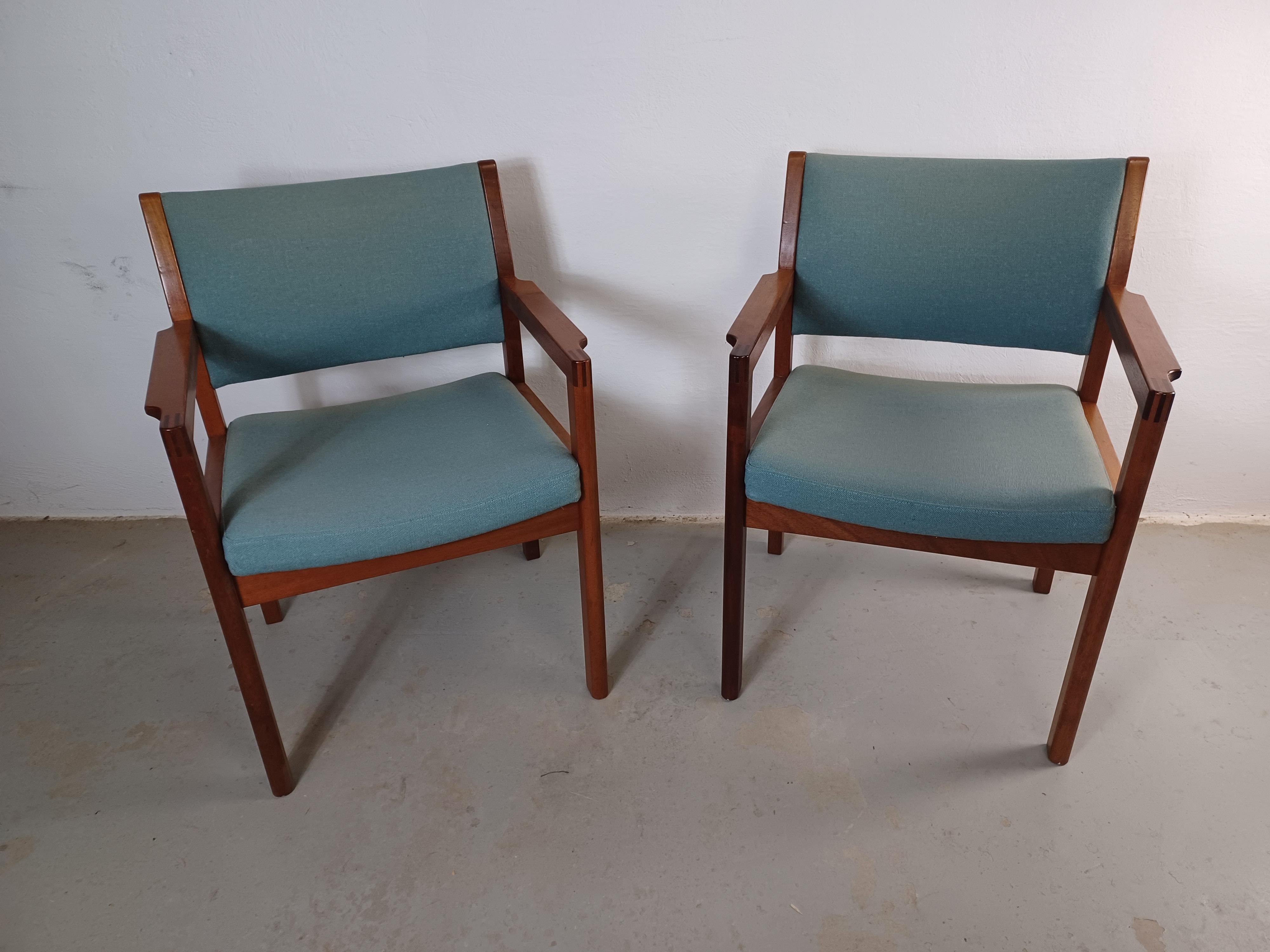 1970s Christian Hvidt Set of two armchairs in mahogany by Søborg Møbelfabrik.

The chairs were originally designed by Christian Hvidt for Søborg Møbelfabrik in 1976 and feature a  well designed and well crafted frame i kahya mahogany  and upholstery