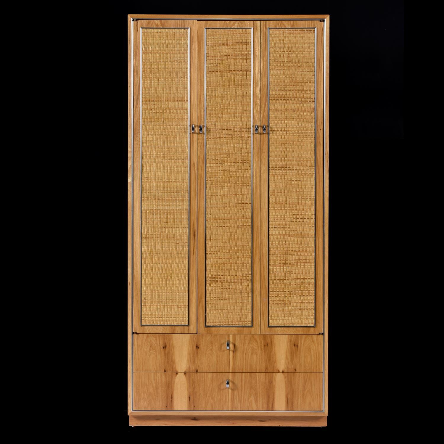 Masterfully crafted and preserved vintage 1970s armoire by John Stuart. We were lucky enough to purchase this piece from a time capsule estate outfitted with premium furnishings. This hickory wood armoire is in outstanding original condition. It