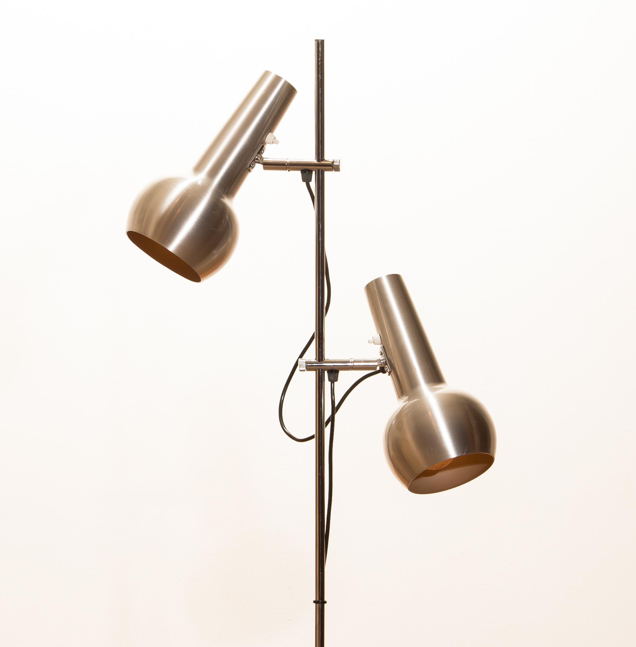 Typical 1970s floor lamp with two big adjustable heads in chrome and aluminium combination and made by Koch & Lowy, 1970s.
In good condition and technical 100%.
Both lamps/shades are with a switch provided.
Period: 1970s
The dimensions are 140 H