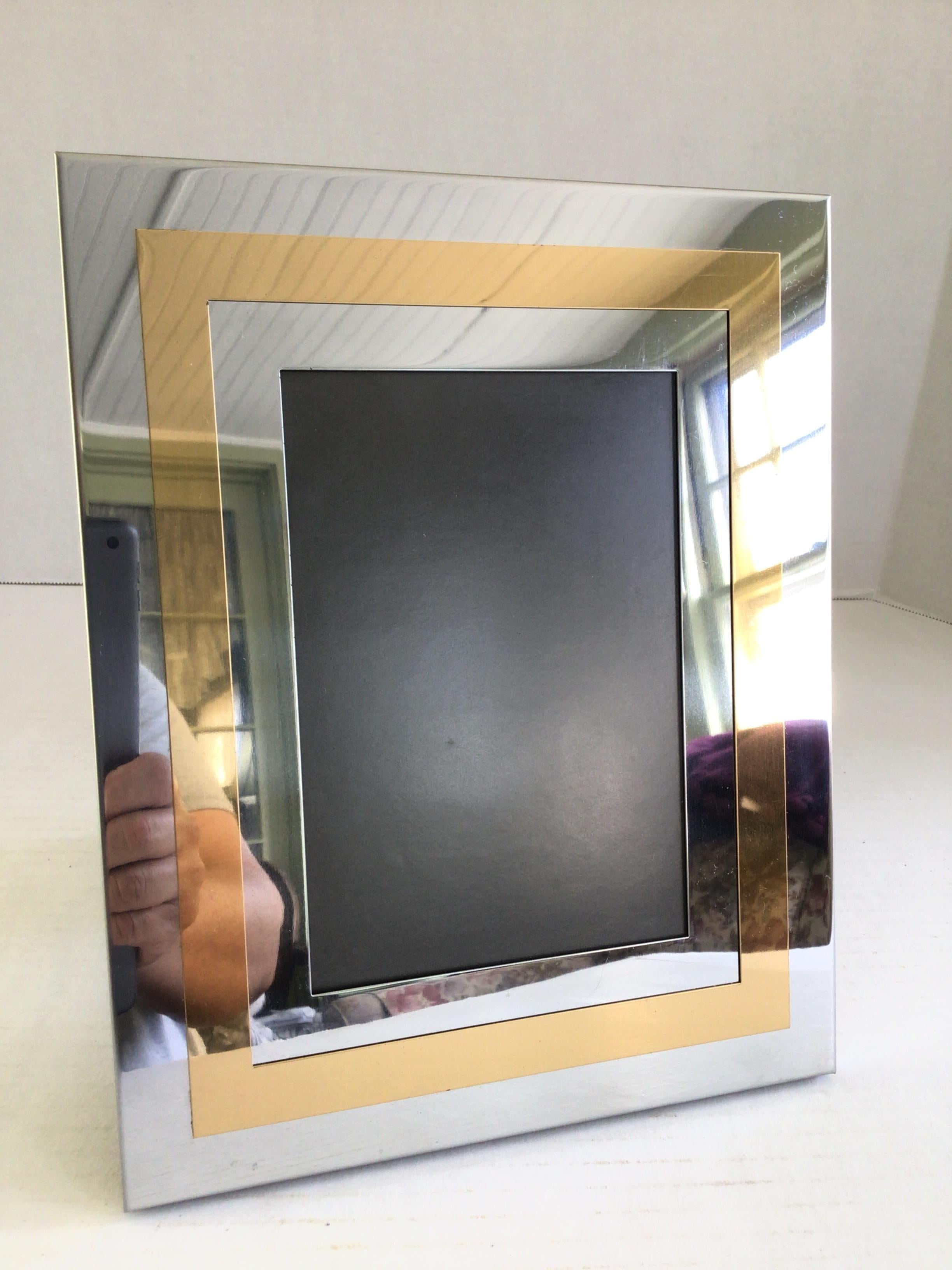 1970s Chrome and Brass Picture Frame
Clear glass in picture frame opening (as shown in picture)
Opened Depth: 7” 
