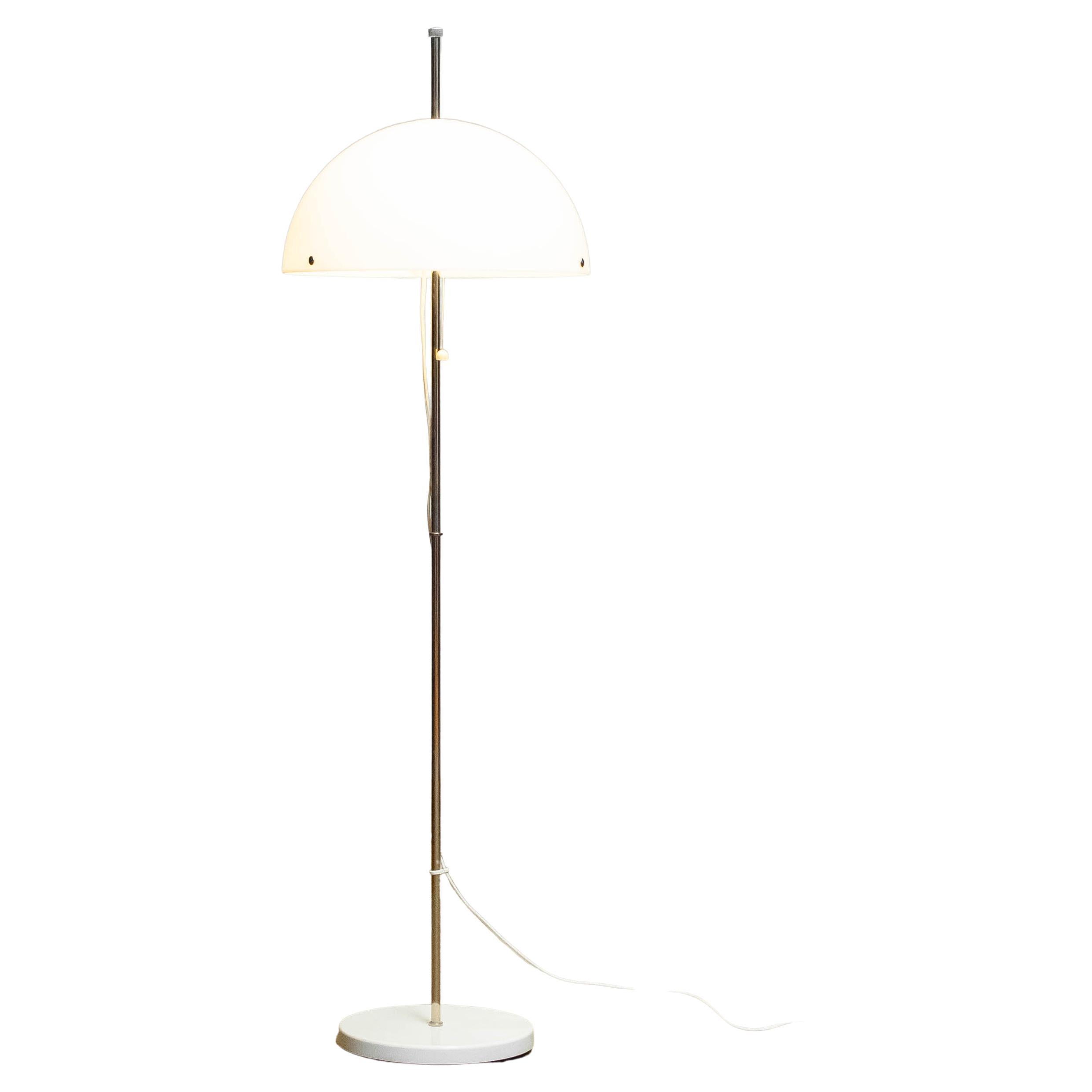Mushroom floor lamp made by Fagerhult in Belysning Sweden in the 1970's. The chrome stand can be split into half and therefor also used as a table lamp. The acrylic shade is in allover good condition. Consists two E28 screw fittings which can be