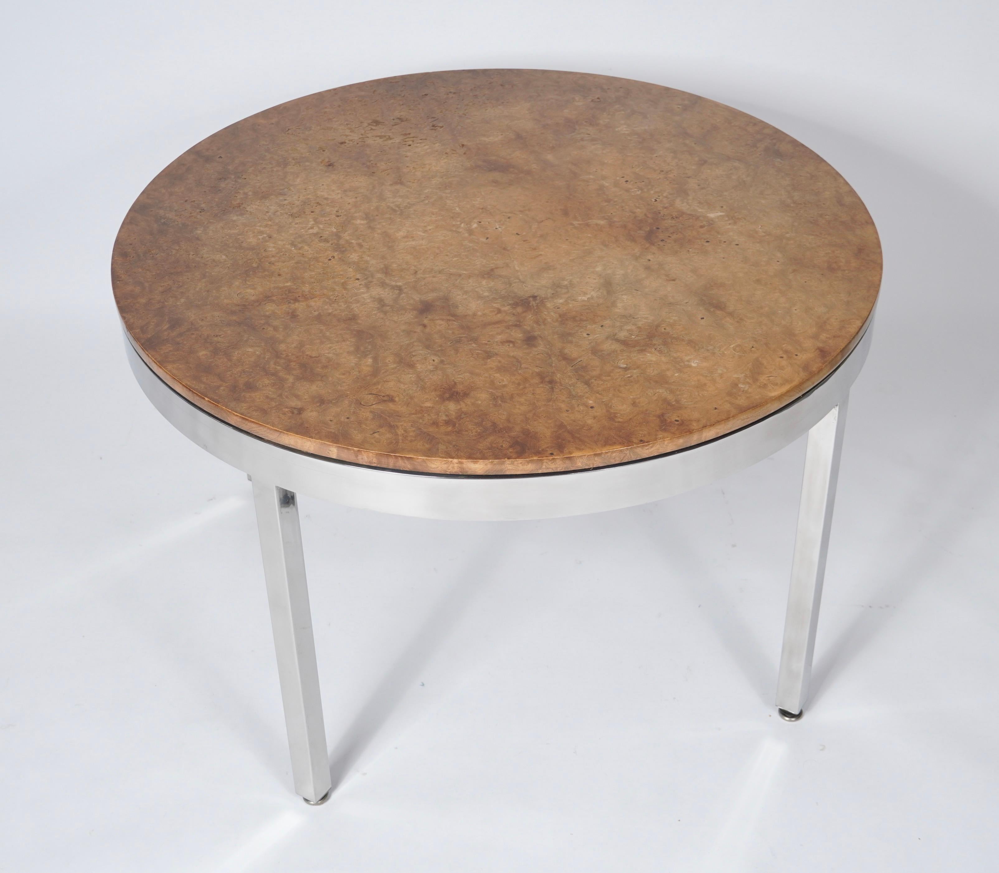 1970s Round chrome and burl dining table, quarter panels of burl on the round top with squared robust  legs. A sleek modern design from the period.