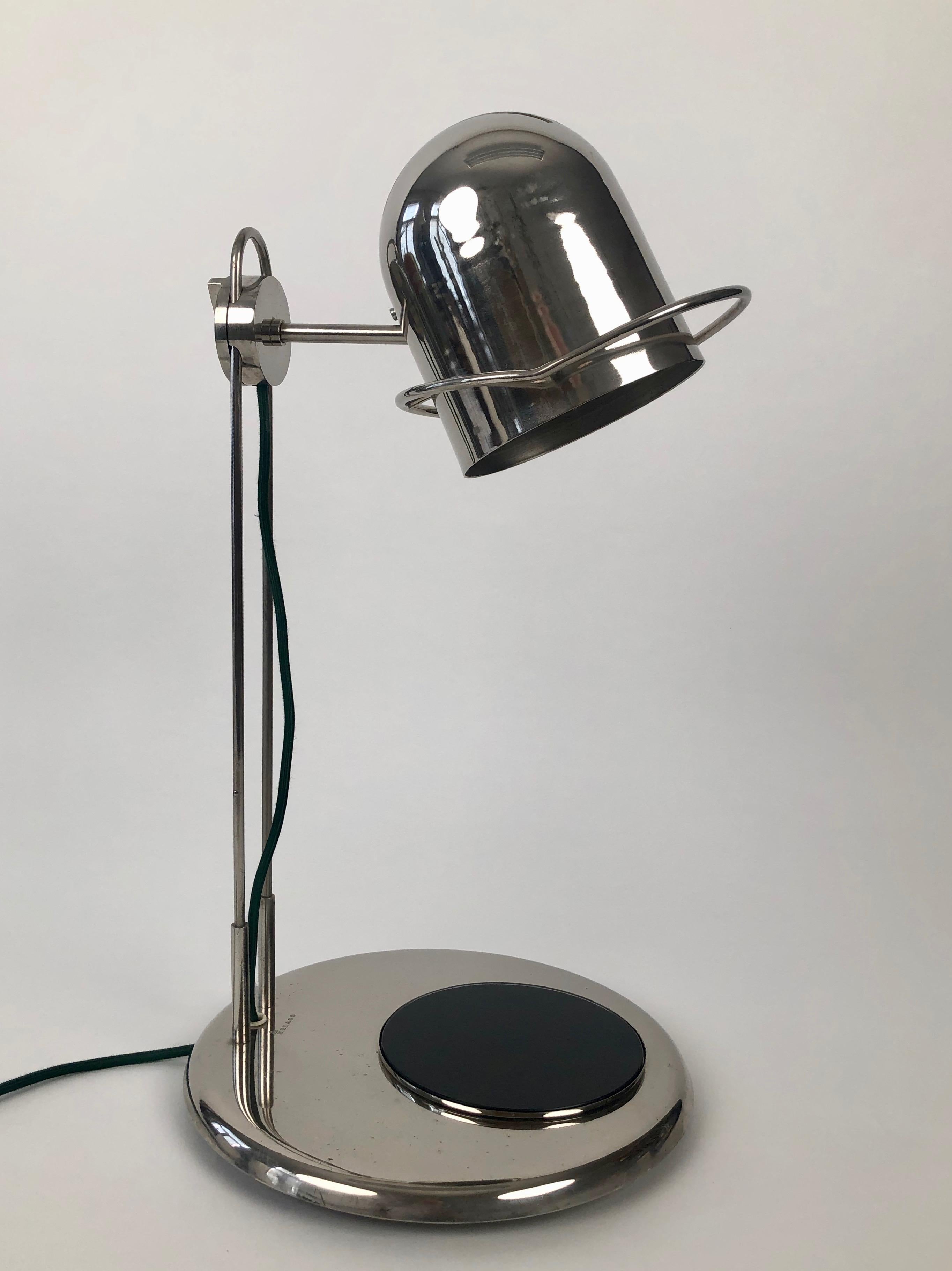 This is an unusual table lamp from the 1970's. It may have been used for industry . Its real use remains a mystery.
It is very well made with the chrome platting in very good condition. The original cable was green and has been replaced with a