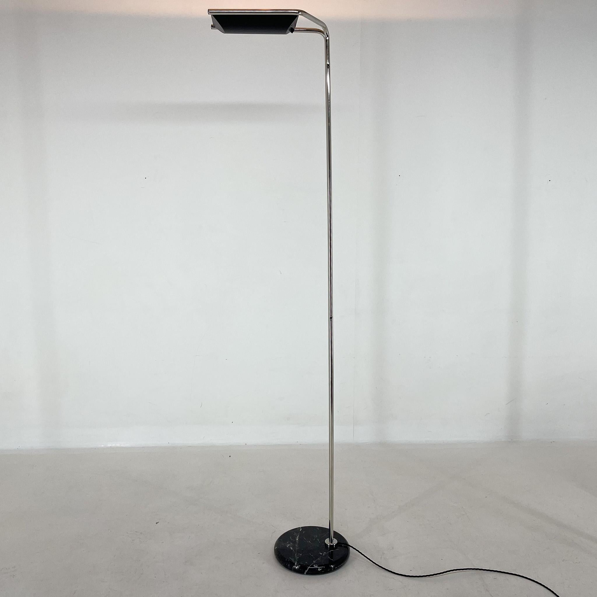 Vintage design floor lamp by Bruno Geschelin for Guzzini, produced in Italy in the 1970's. Made of chrome with marble base, dimmer, renovated, rewired.