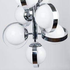 1970's chrome pendant light with white glass globe shades