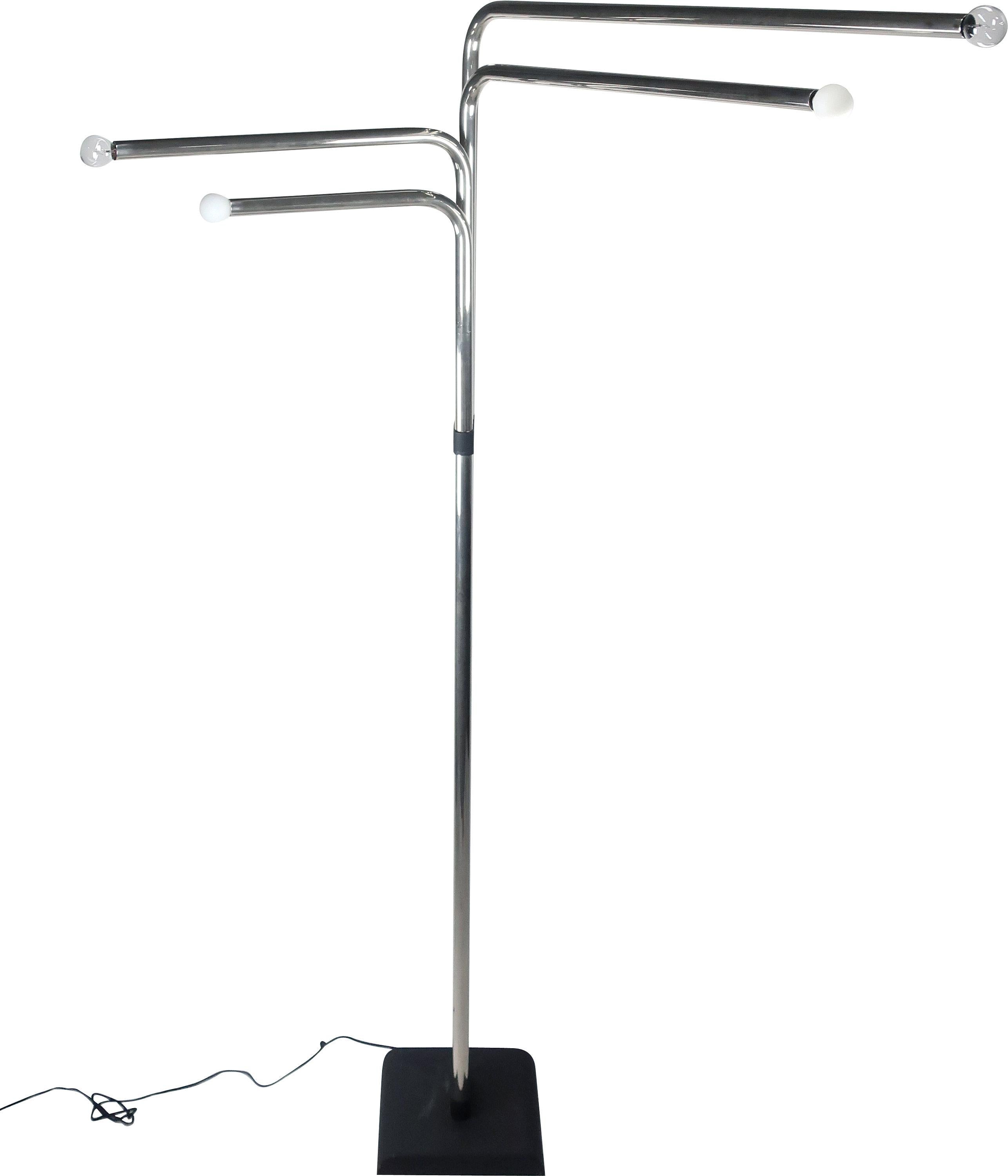 A stunning sculptural floor lamp by Goffredo Reggiani with four articulated chrome arms standing 6.75 feet tall (81 inches). Each of the four chrome tubes is bent at 90 degrees and can be rotated individually, and each tube has a bulb at the end of