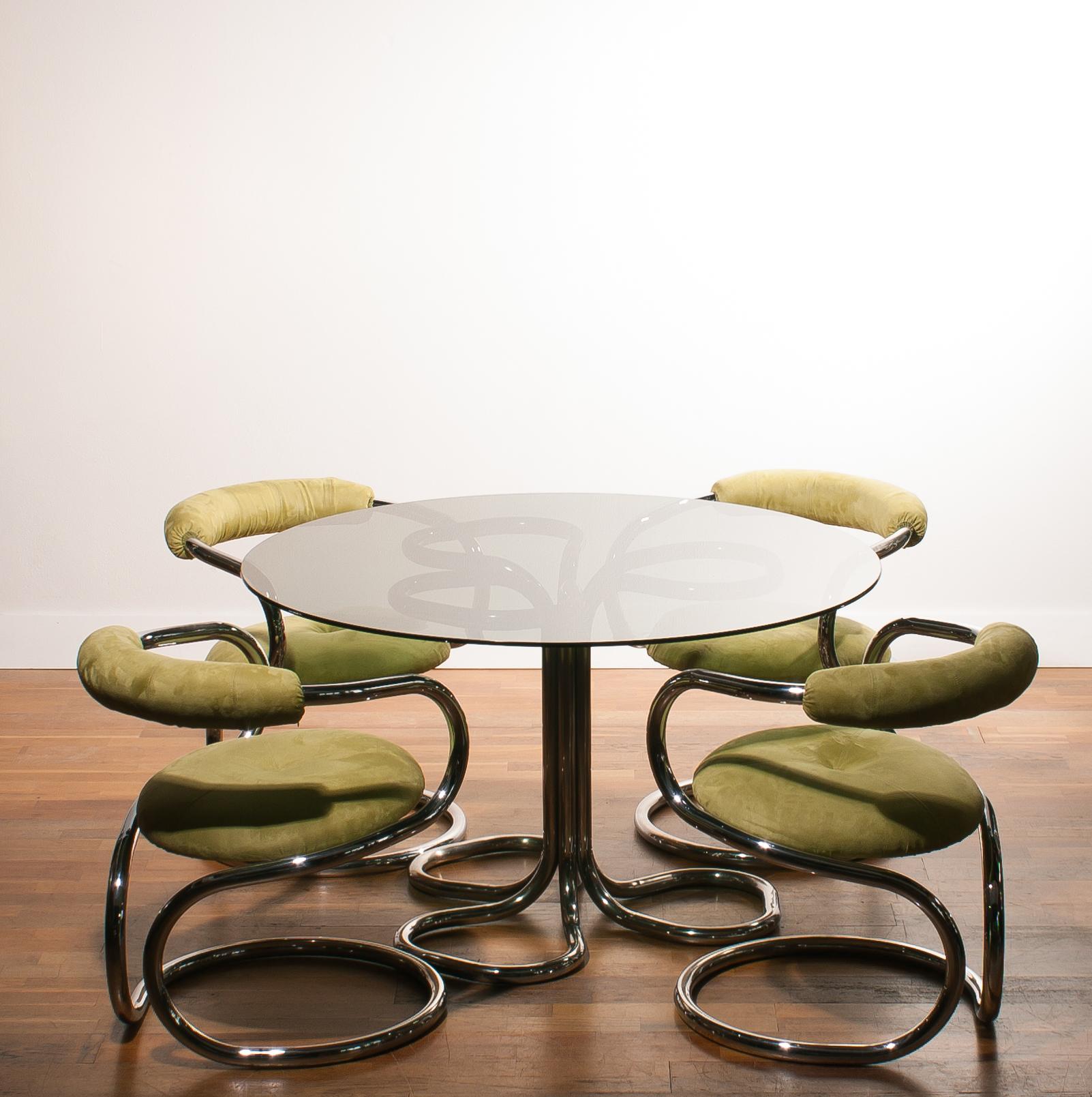 A beautiful set dining chairs designed and produced by Tecnosalotto in Italy.
The chairs have a chromed base with a yellow-lime faux suede upholstery.
They are in very nice condition,
circa 1970s.
Dimensions: Chairs H 73 cm, W 59 cm, D 60 cm, SH