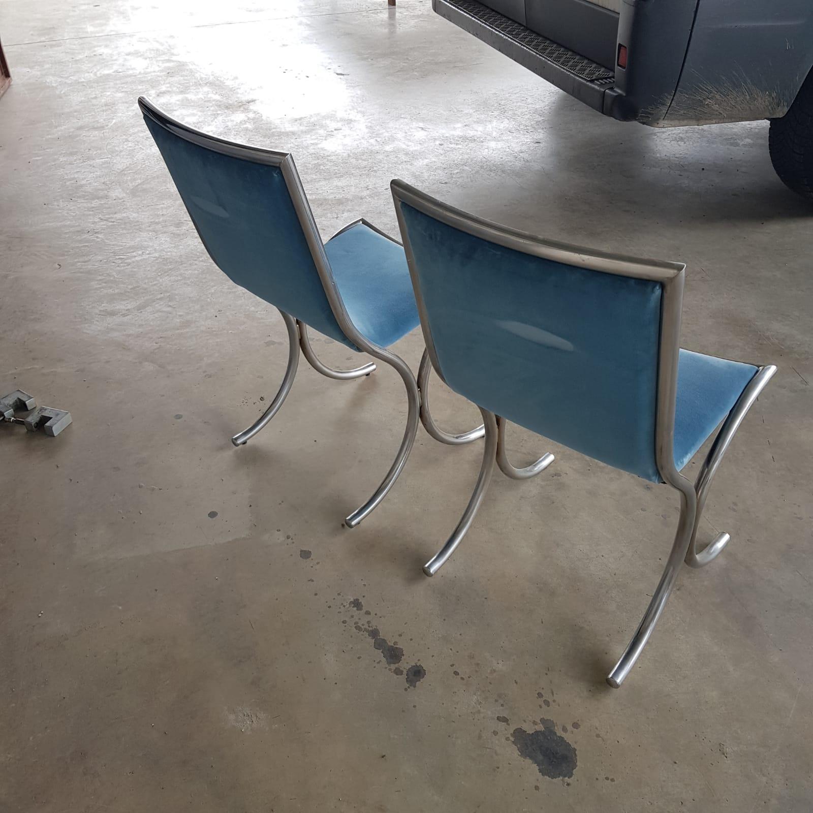1970s chromed steel light blue velvet chairs, set of 2 
Recently reupholstered 
Size: W 44 cm, D 45 cm, H 84 cm.
 