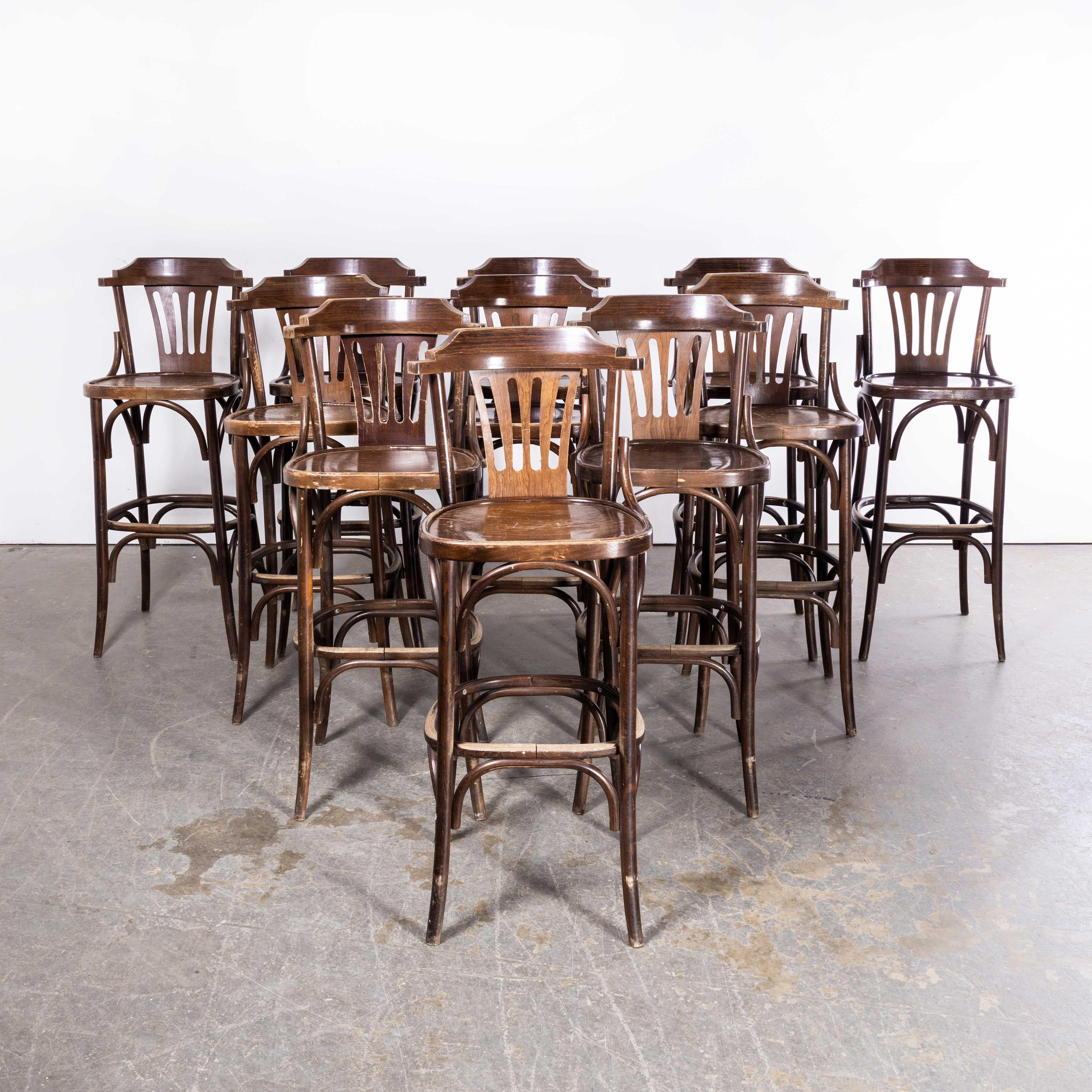 1970’s Classic High Back Bentwood Bar Chairs With Arms – Various Quantities Available
1970’s Classic High Back Bentwood Bar Chairs With Arms – Various Quantities Available. These high bar chairs were produced by the famous Czech firm Ton, a post war