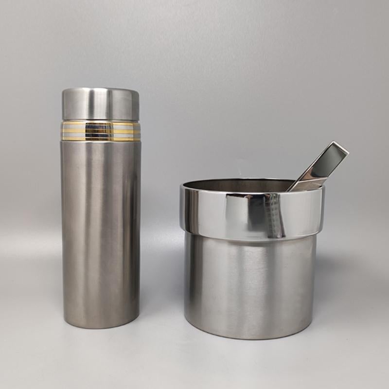 1970s gorgeous cocktail shaker in gold 24K and stainless steel with Ice Bucket by Piazza. Made in Italy.
The items are in excellent condition
_Cocktail Shaker diameter 2,75