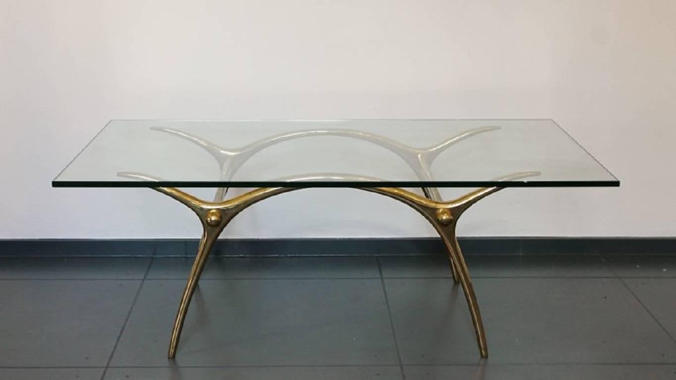 1970s coffee table in glass an polished brass by Belgian designer Kouloufi.