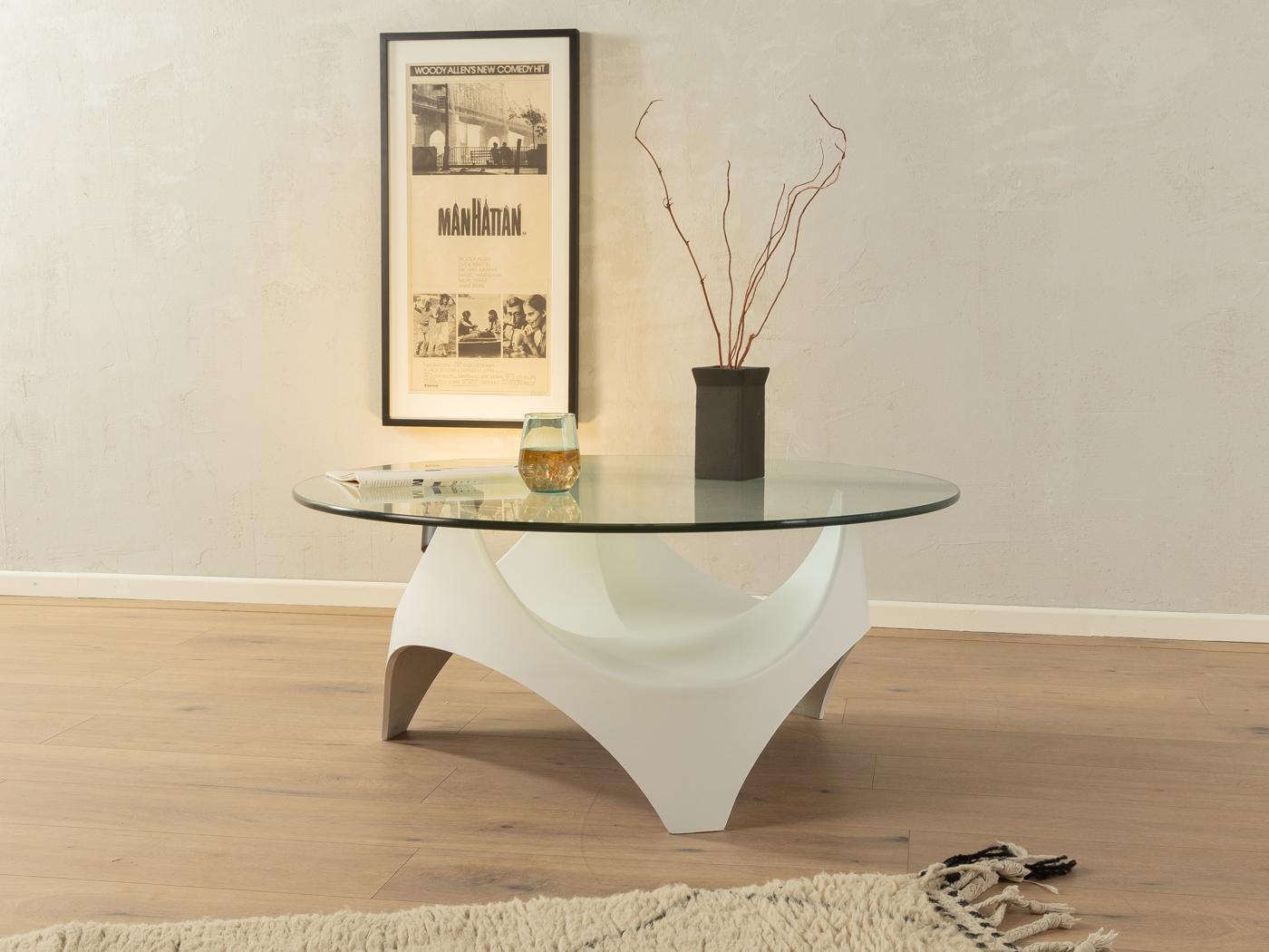 Space age coffee table by Opal Möbel from the 1970s. High-quality white painted plastic frame with a glass table top.
Quality Features:

    very good workmanship
    high-quality materials
    Made in Germany, manufacturer: Opal Möbel

Condition &