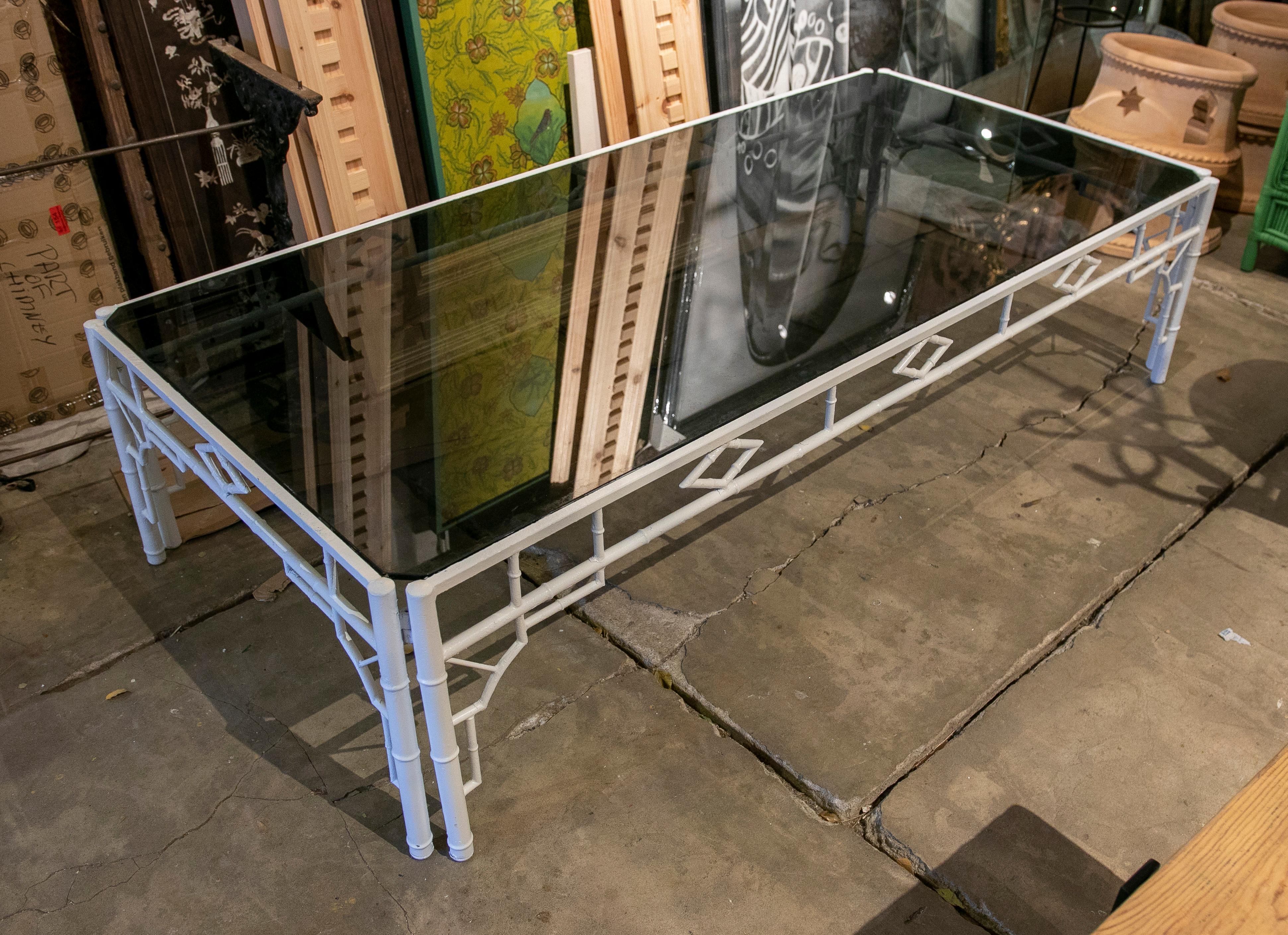 Spanish 1970s Coffee Table with Bamboo Imitation, Metal Frame and Smoked Glass  For Sale