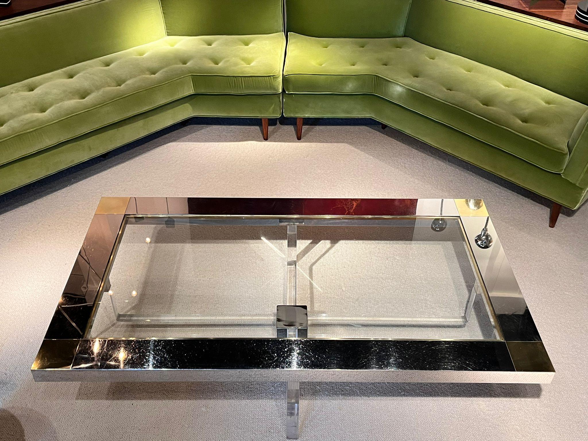 1970s Coffee table with glass top
Chrome and brass details on the top.
Lucite feet.
Designed by Sandro Petti, architect.
Italy, 1970
90x 160 × 38 cm