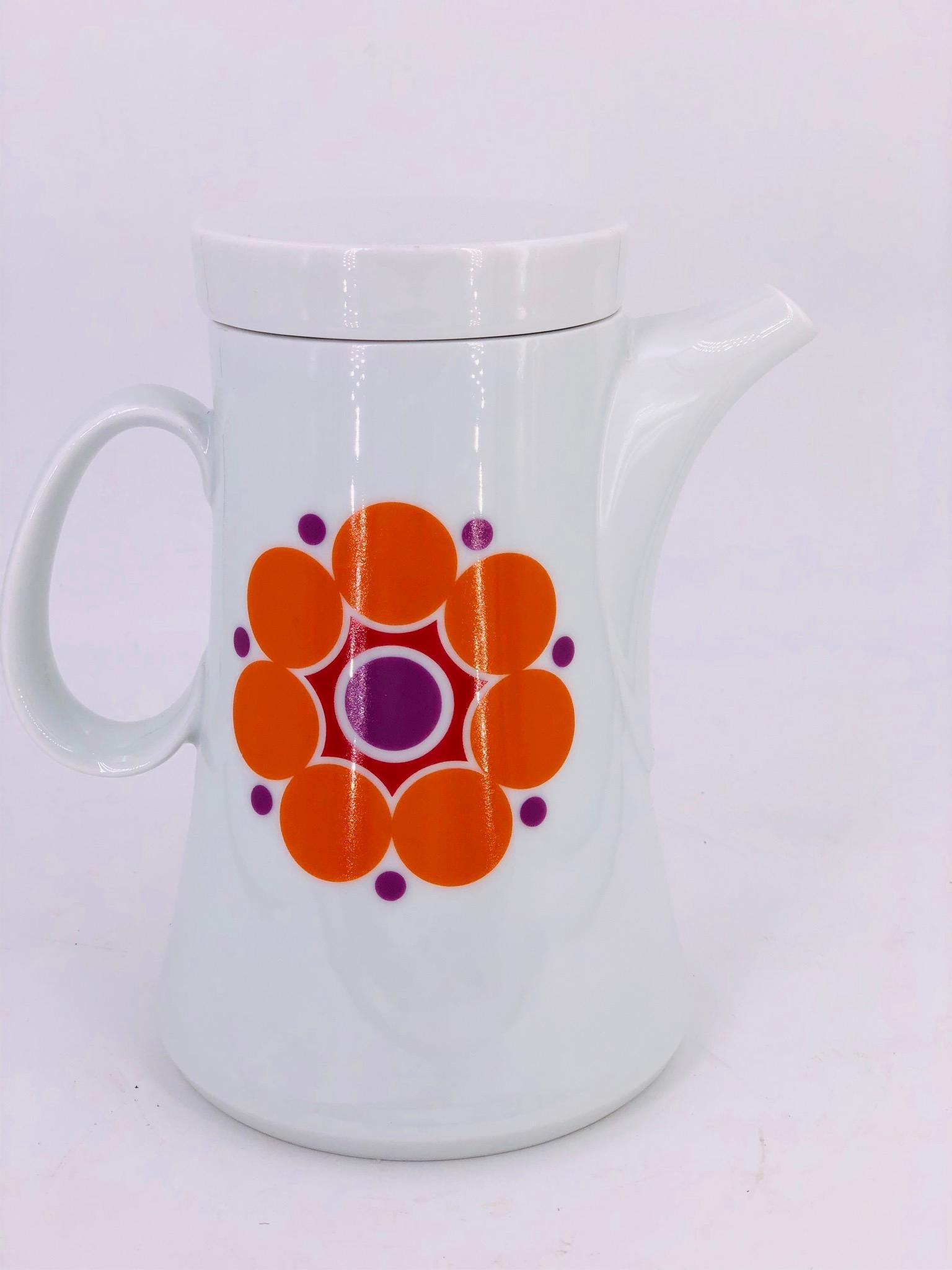 A beautiful porcelain pitcher circa 1970s, can be used for coffee or tea by Schonwalnd Germany excellent condition no chips or cracks like new, cool design hippie style.