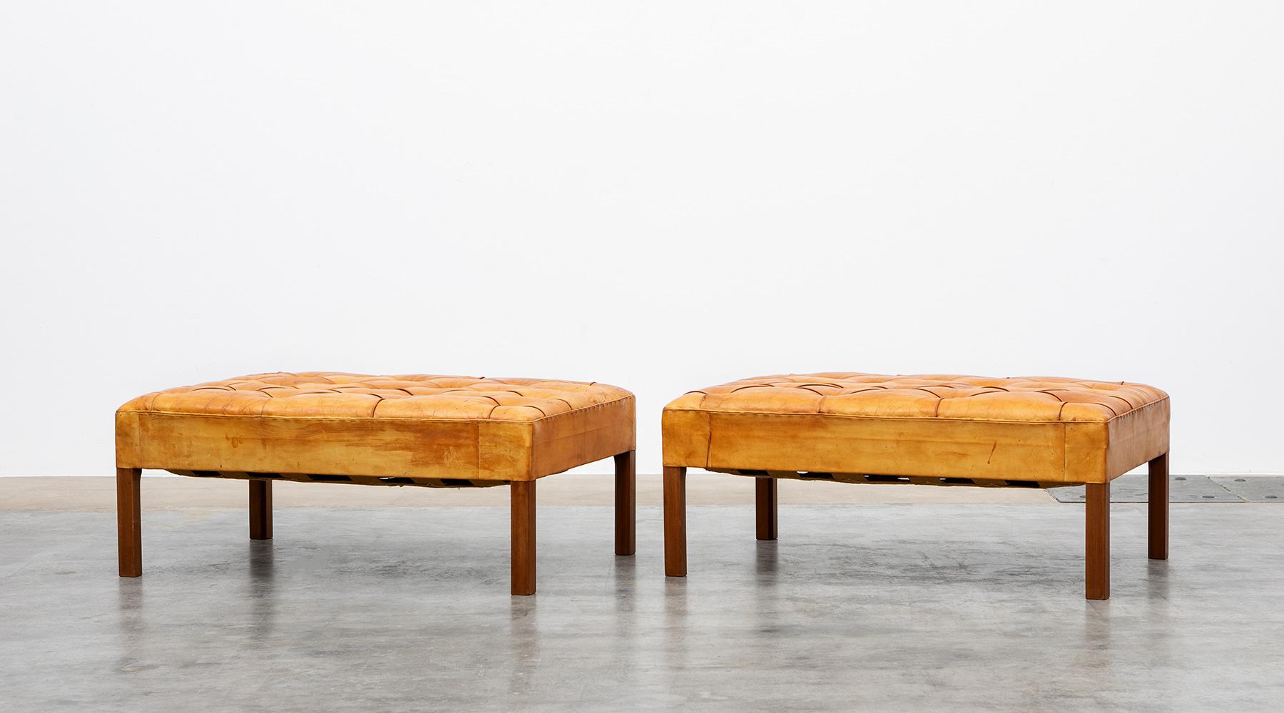 Pair of stools by Kaare Klint for Rud Rasmussen, niger leather, mahogany, Denmark, 1933.

Outstanding pair of stools originally made for the matching freestanding mahogany sofa units. Seats are upholstered in patinated Niger leather and have