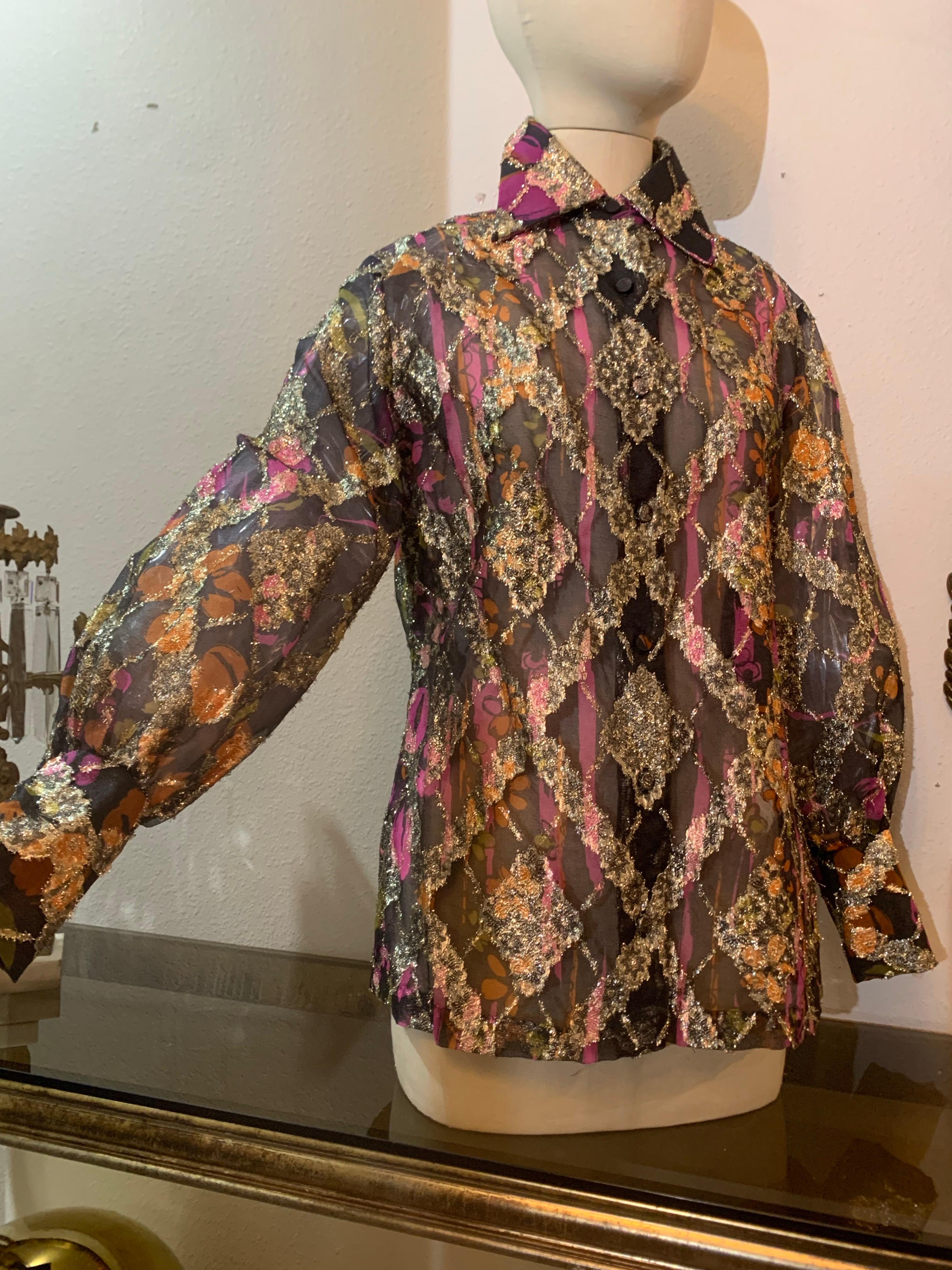 1970s Contessa Monique Sheer Eyelash Textured Gold Lame Organza Blouse In Harlequin Diamond Pattern.  Pointed collar with button down front. Deep 3-button cuffs on sleeve. US size 6. 