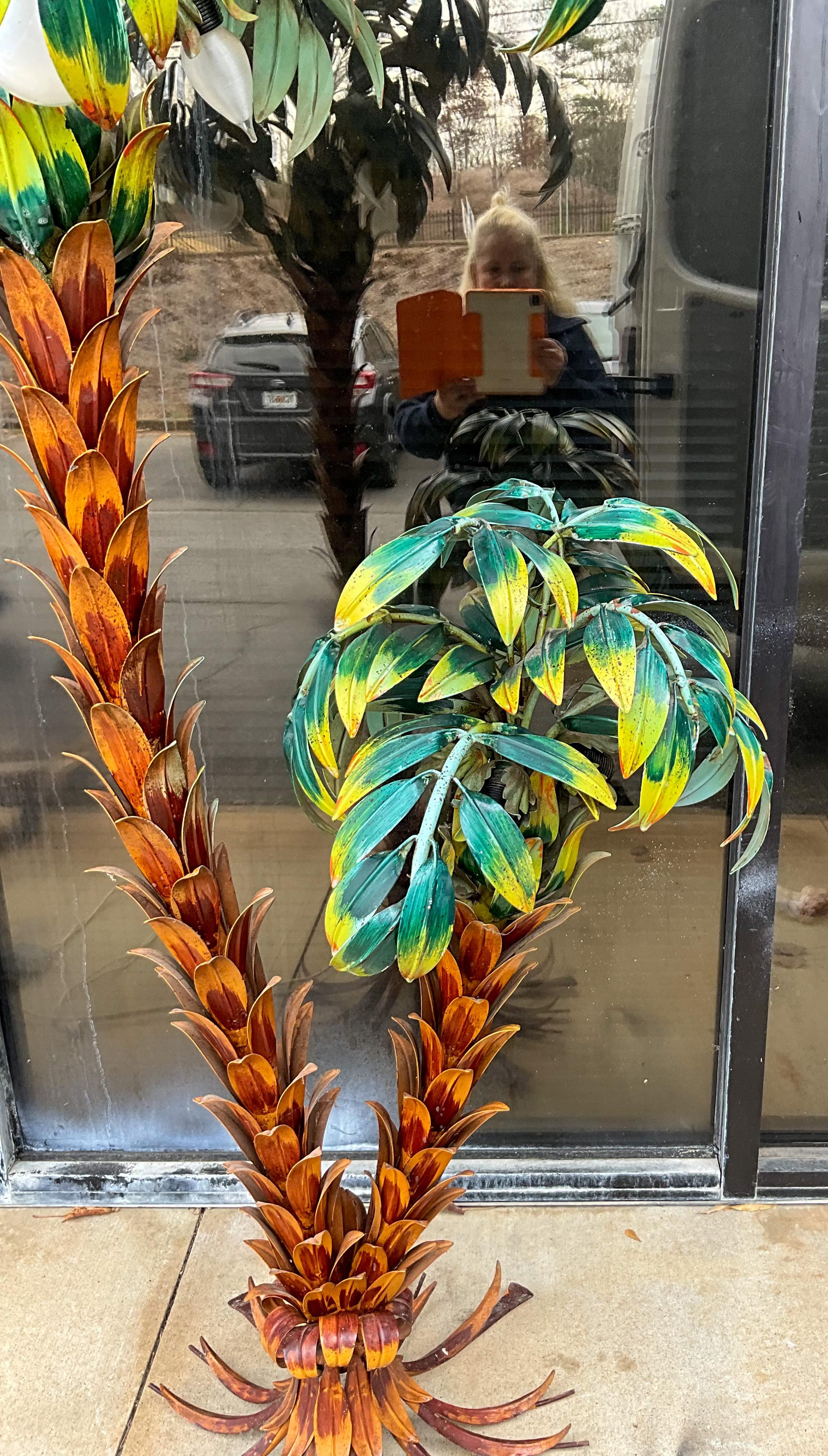 This is too fun! This is a limited release piece by the German artist, Hans Kogl. It dates to the 1970s and is a dual trunk floor lamp. Both palms support 3 bulbs. The coloration is so vivid! It perfectly mixes art and functionality. It is in very