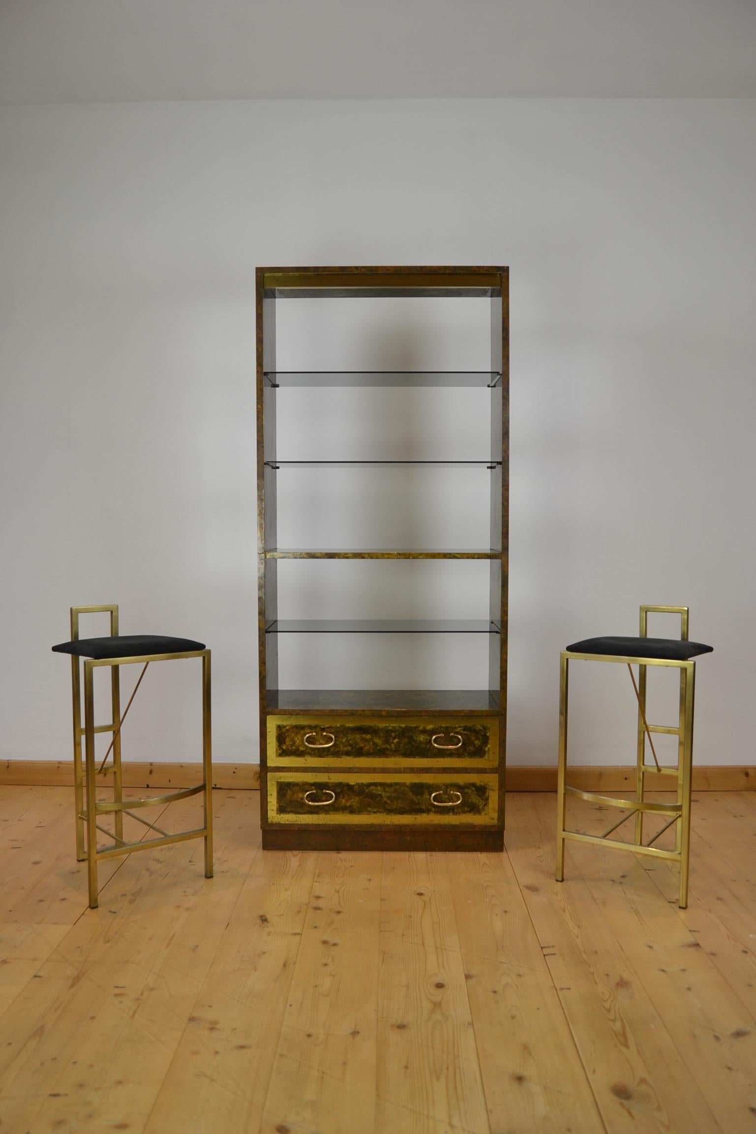 1970s shelves, etagère, bookcase, showcase, room divider 
with smoked glass shelves and 2 drawers with handles.

An open cabinet finished all around the 4 sides with yellow and red copper, 
so does not need to stand against a wall. 
Hollywood